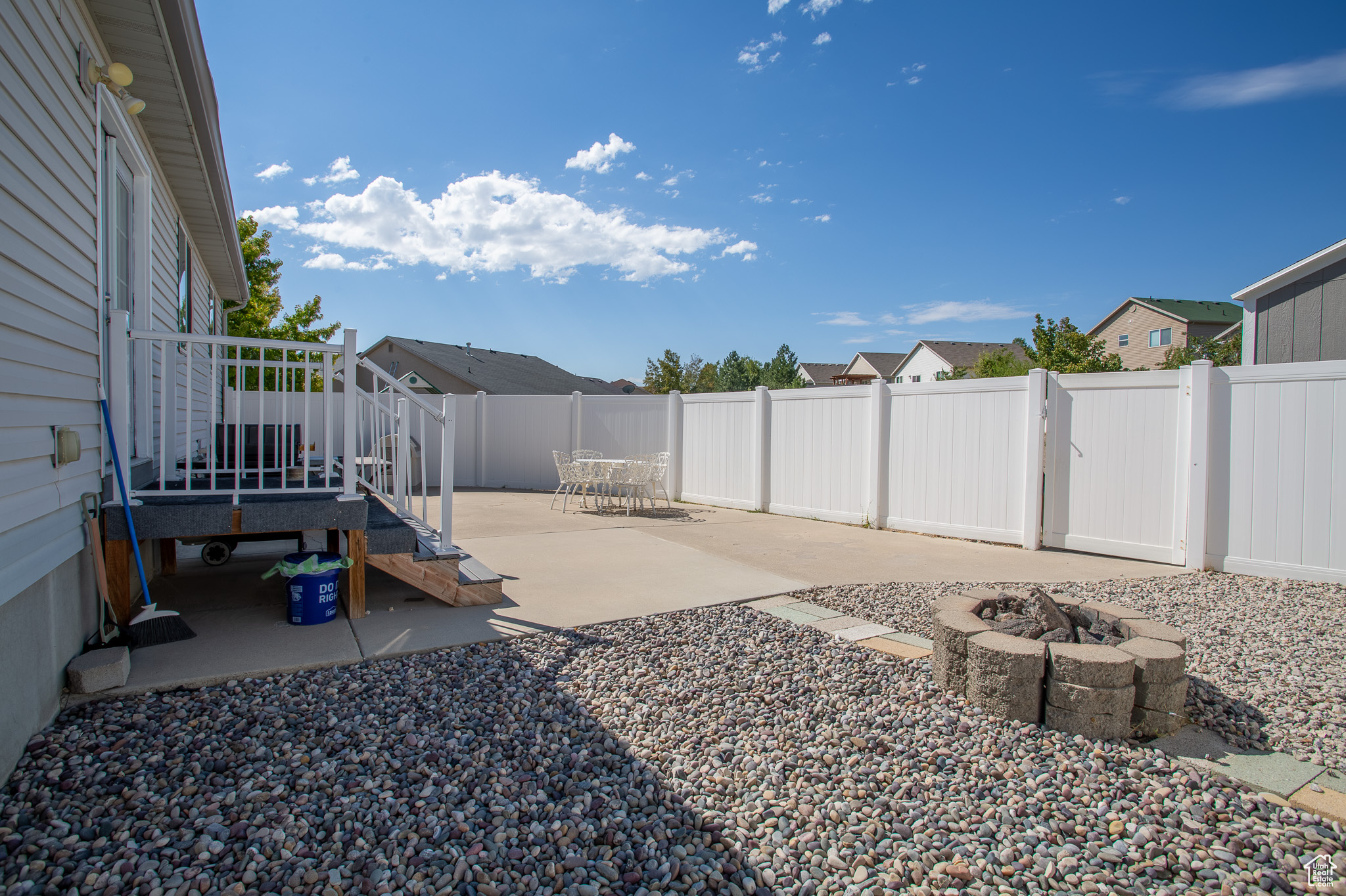 View of yard featuring a fire pit and a patio