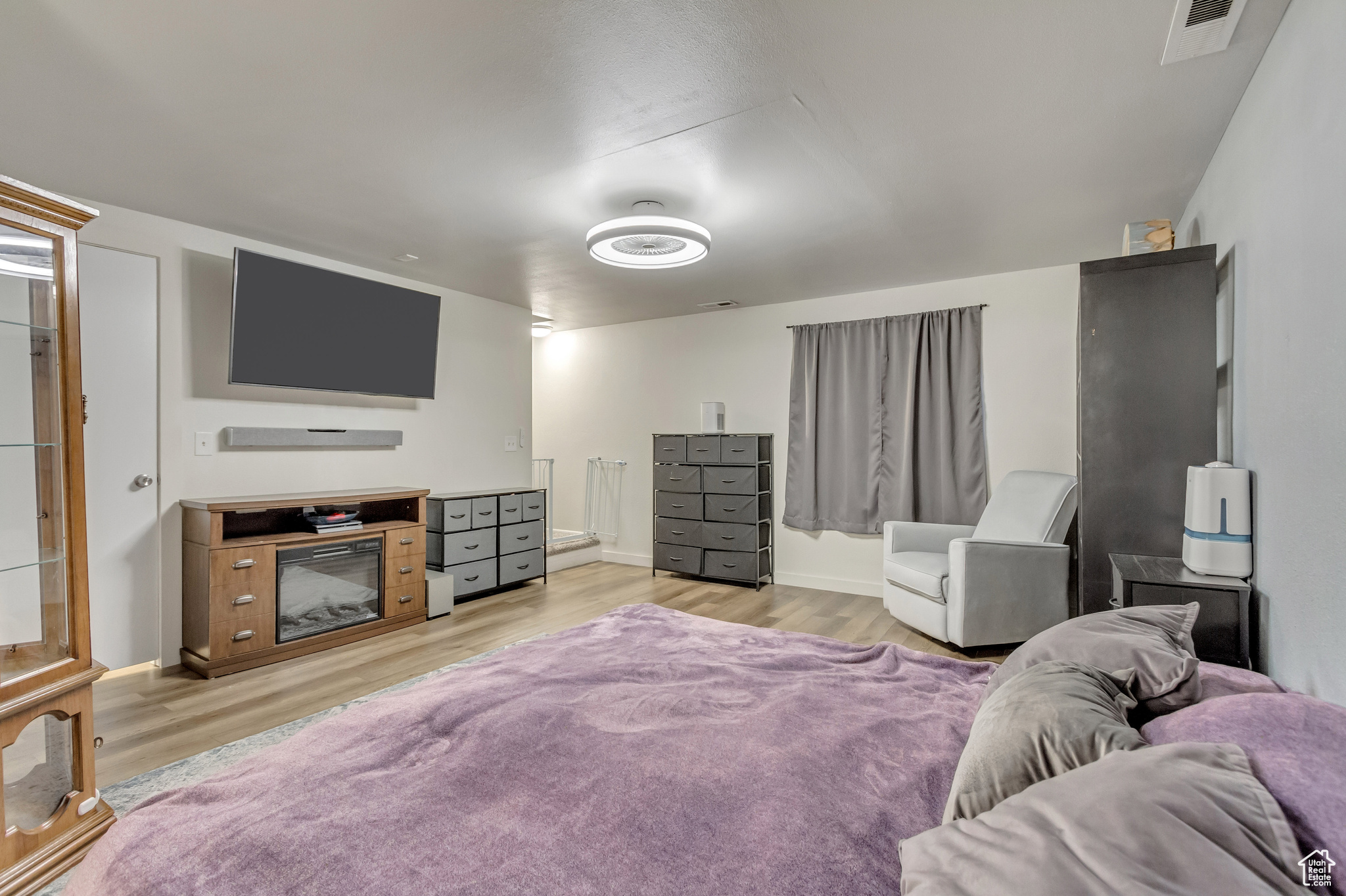 Bedroom with light wood-type flooring