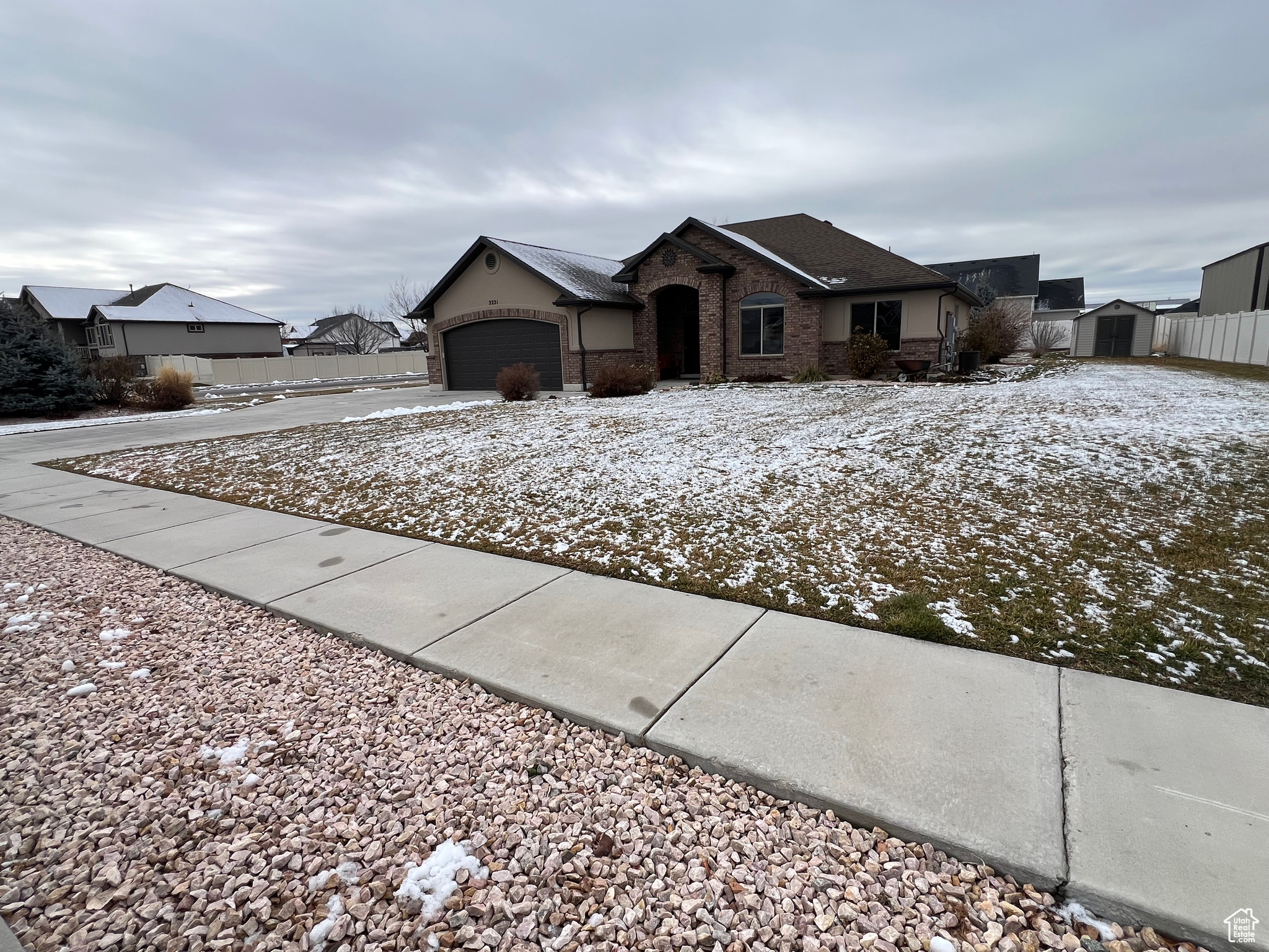 Ranch-style home featuring a garage