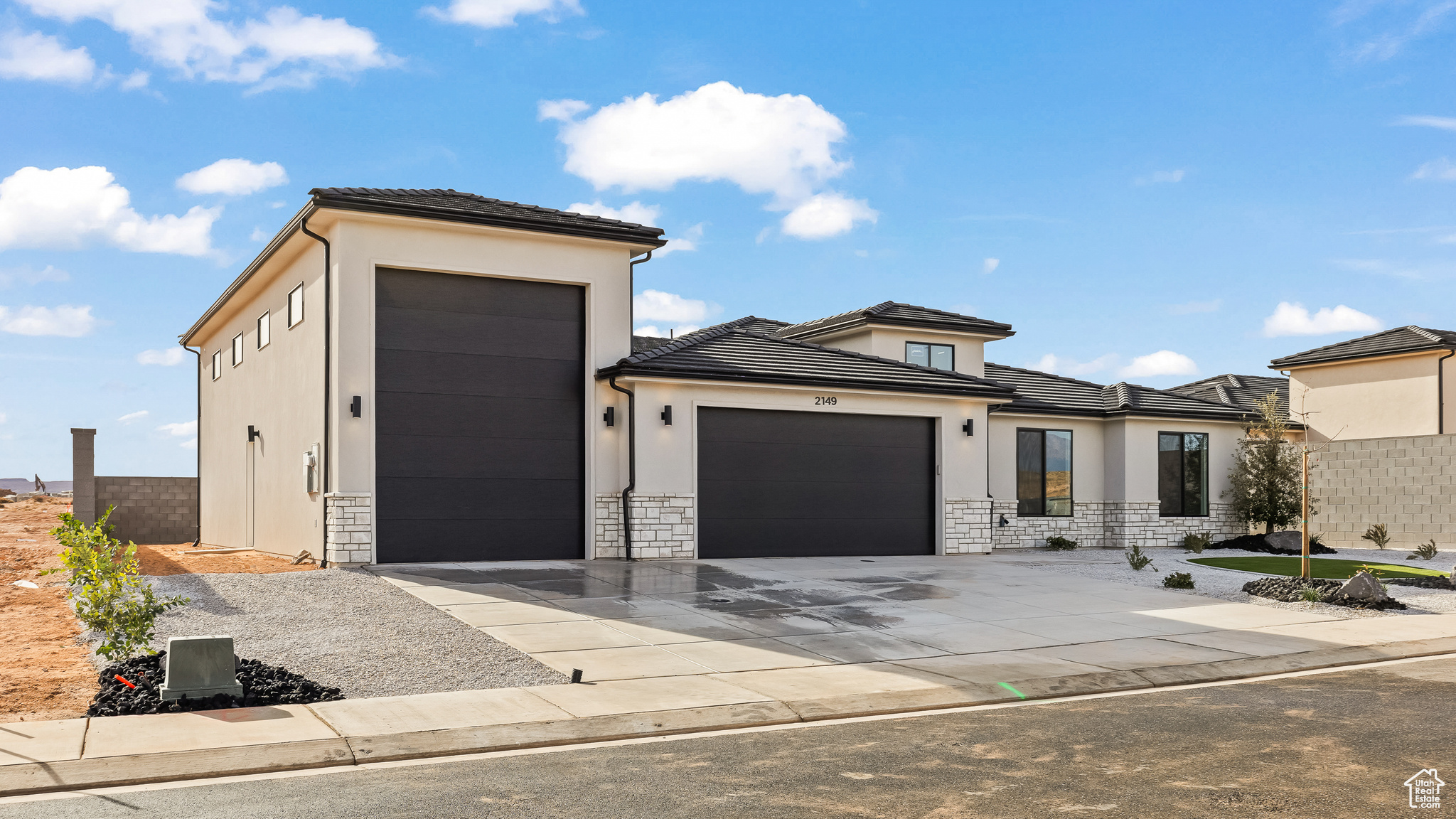 Prairie-style home featuring a garage