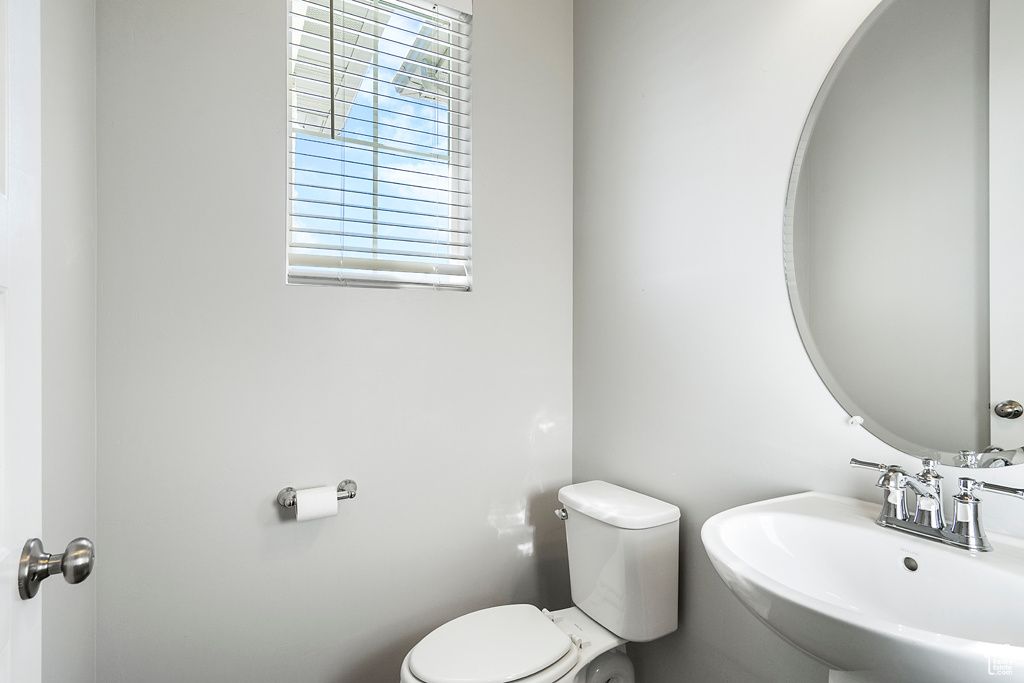 Bathroom with sink and toilet