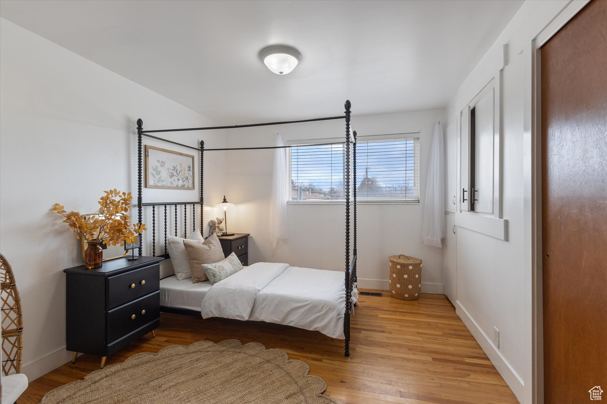 Bedroom featuring hardwood / wood-style flooring