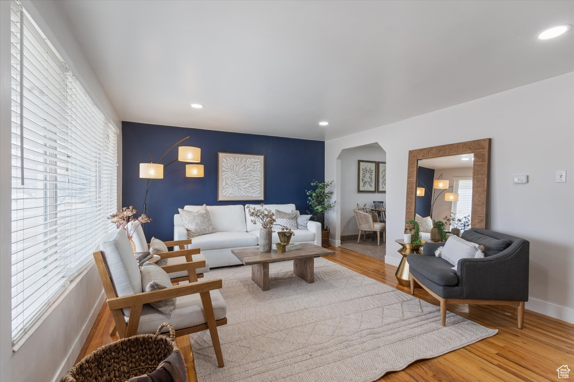 Living room with hardwood / wood-style flooring and a wealth of natural light