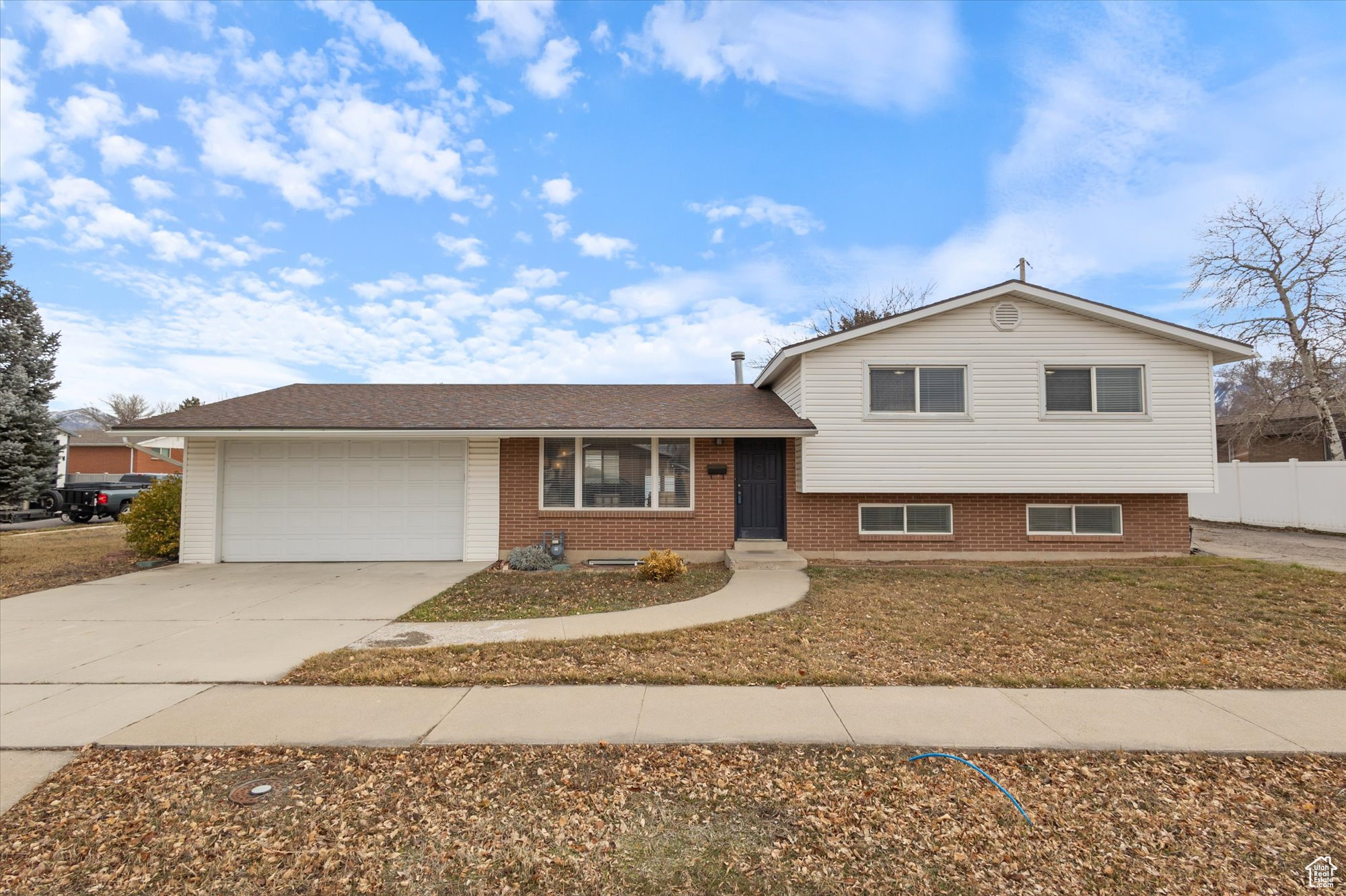 Tri-level home featuring a garage