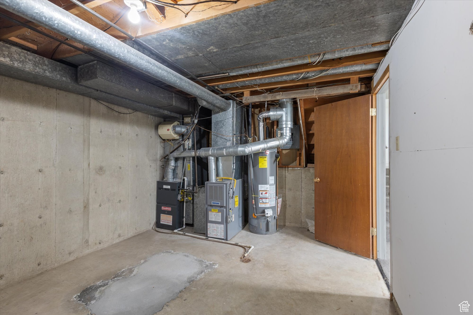 Basement with heating unit and gas water heater