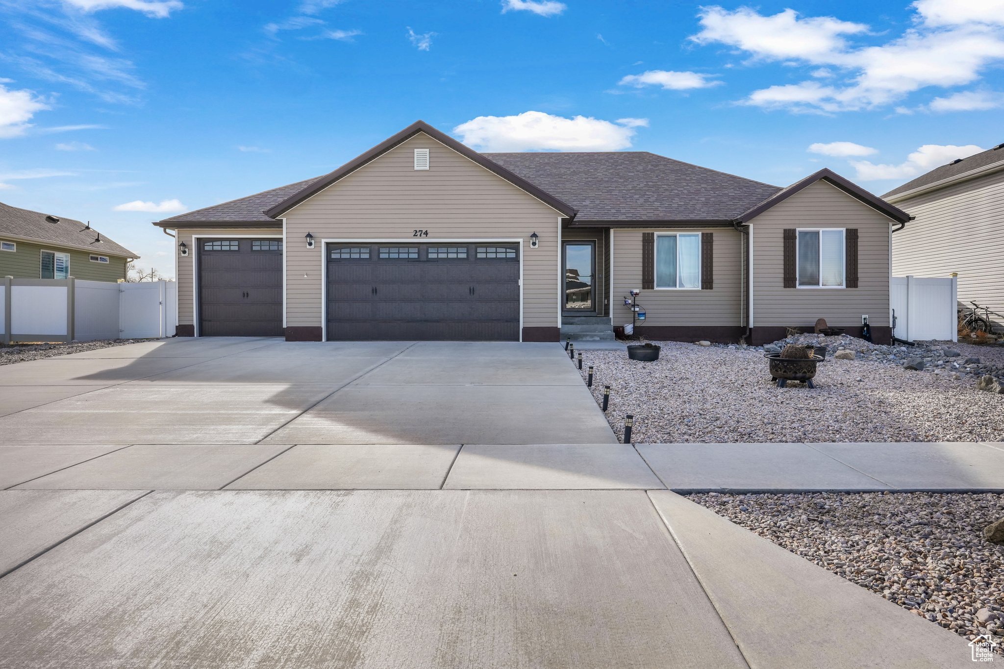 Single story home featuring a garage