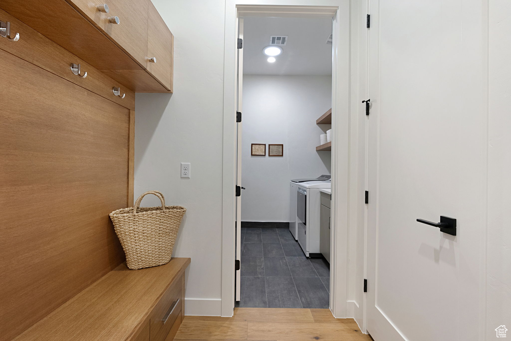 Mudroom with separate washer and dryer