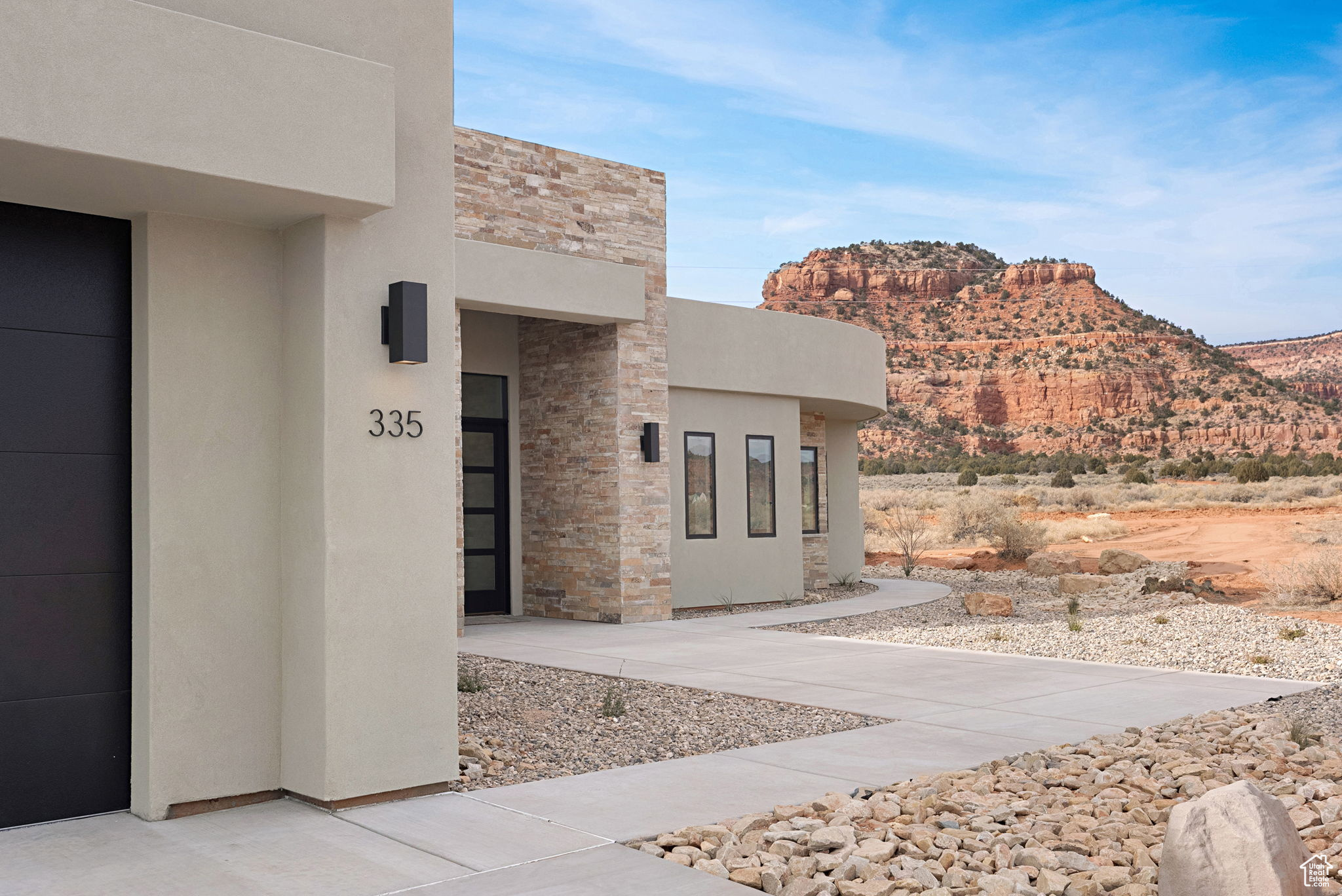 View of exterior entry with a mountain view