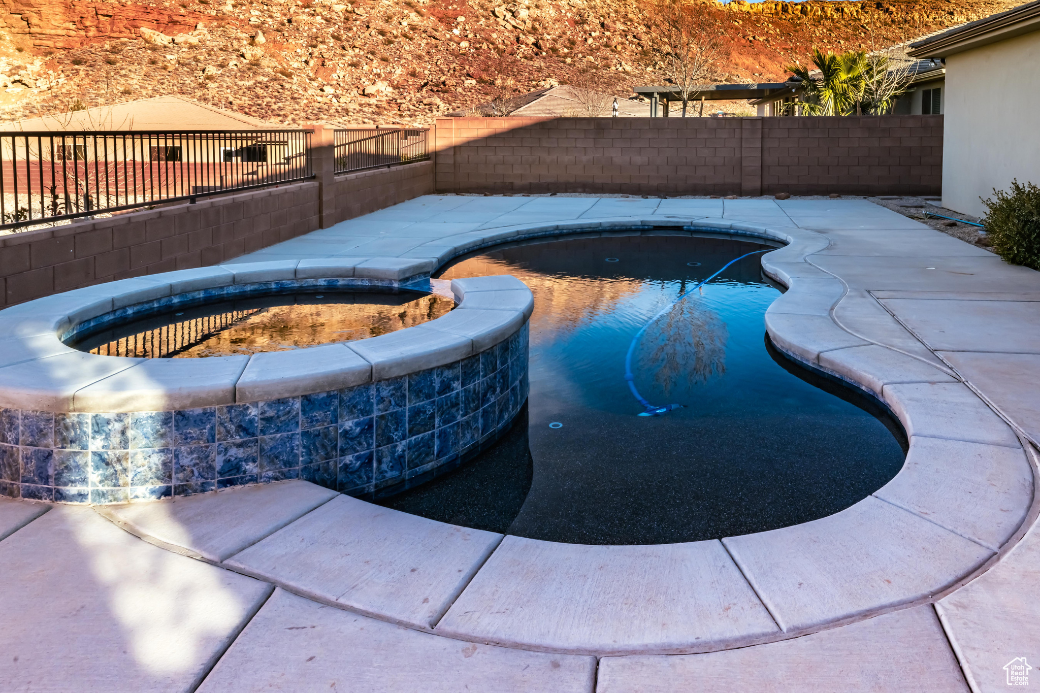 View of pool featuring an in ground hot tub