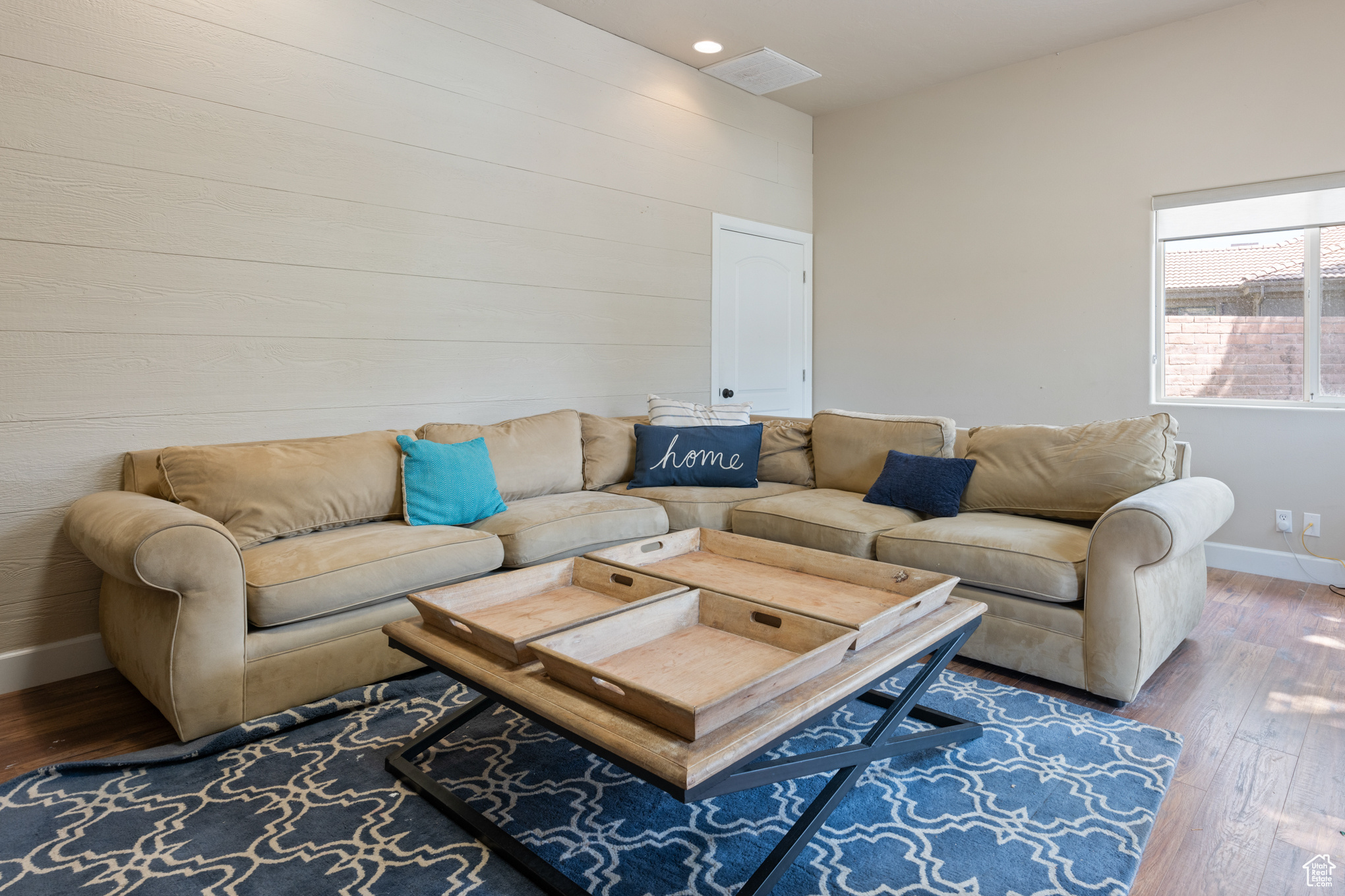 Living room featuring hardwood / wood-style flooring