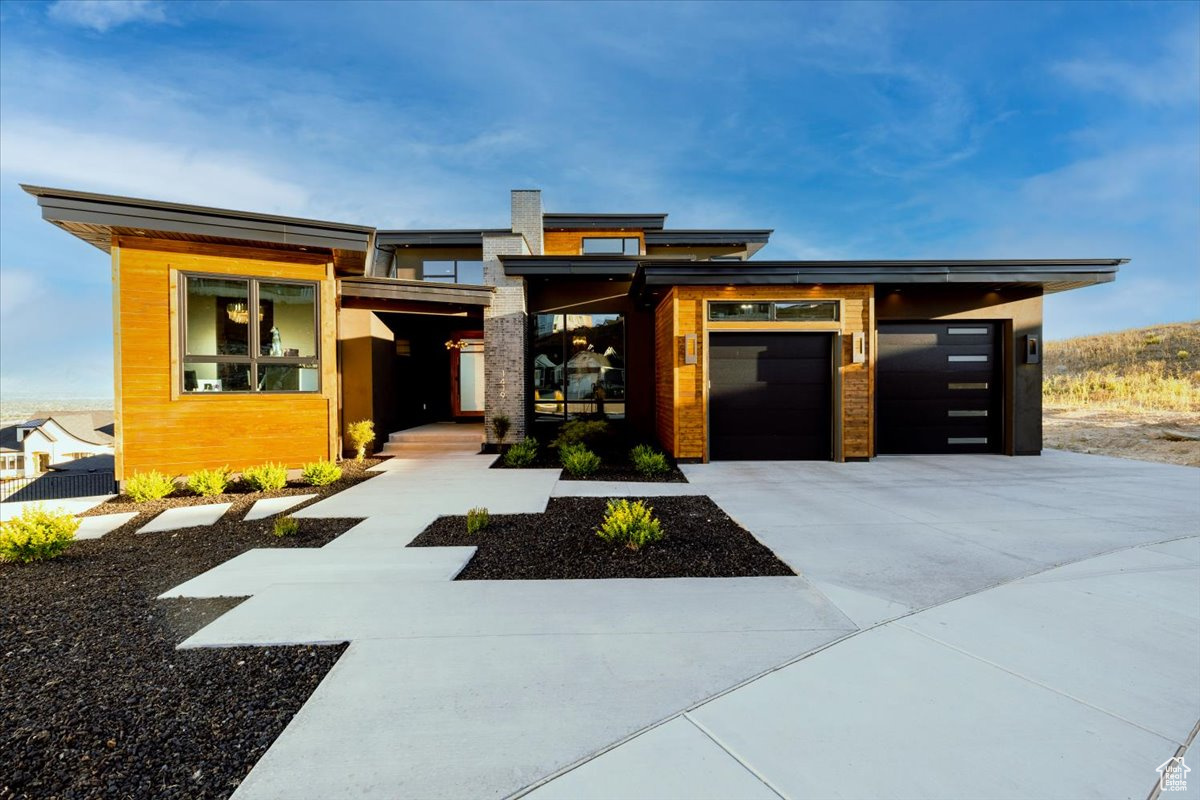 View of front of property featuring a garage