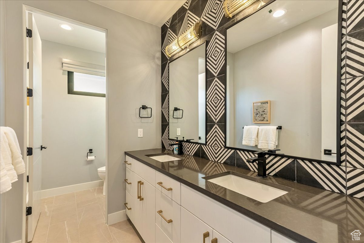 Bathroom with vanity and toilet