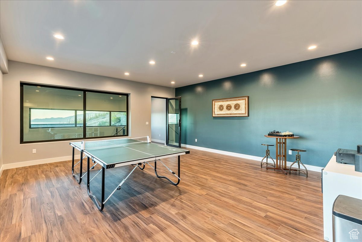 Playroom featuring light hardwood / wood-style floors