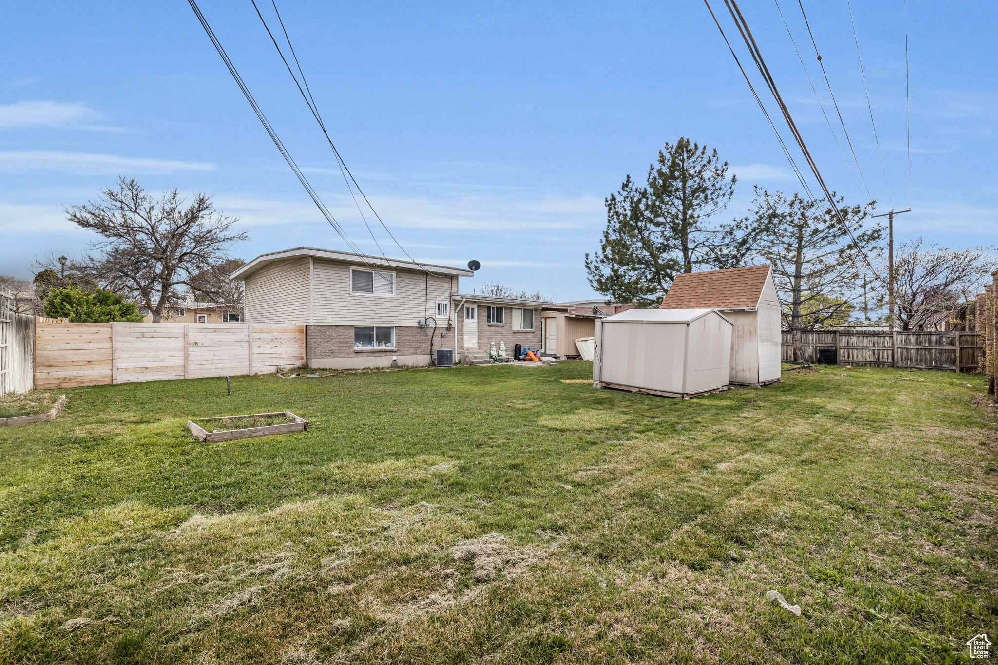 View of yard with a shed