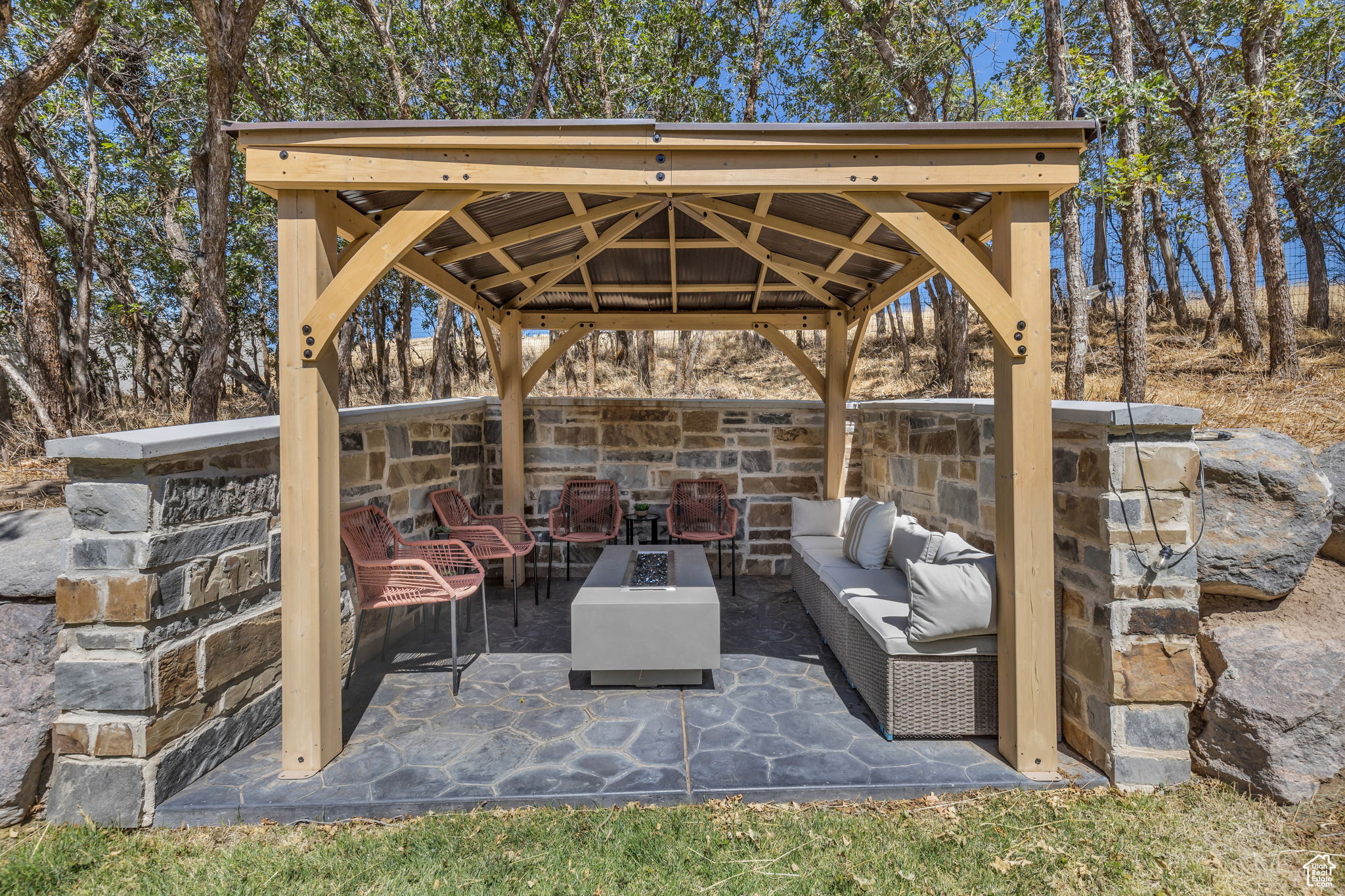 View of patio / terrace with a gazebo and an outdoor living space