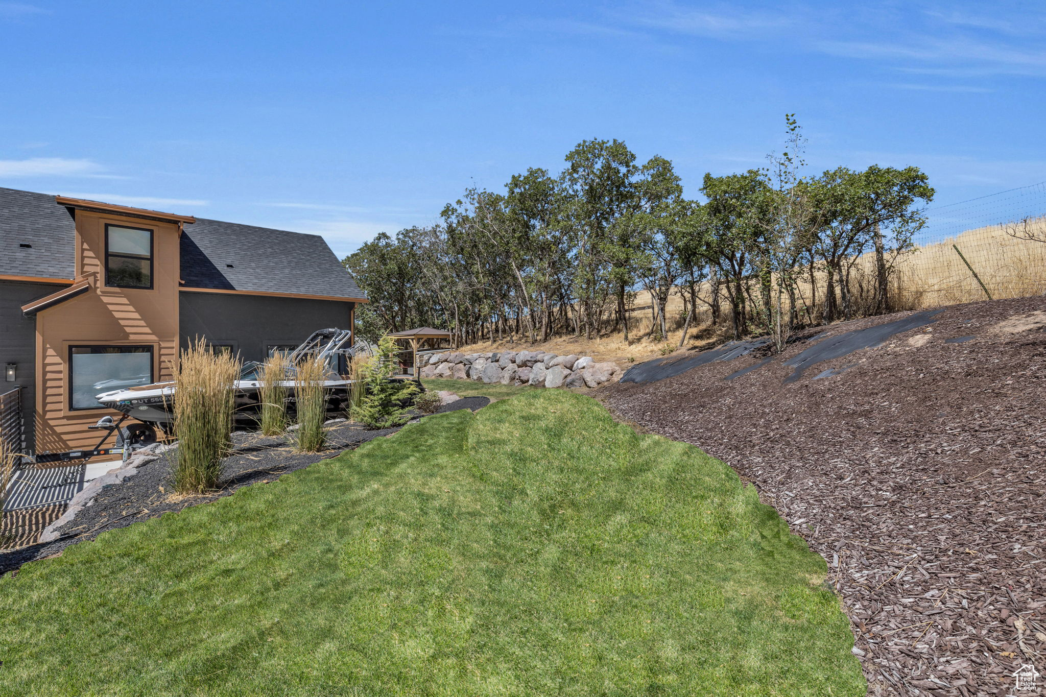 View of yard with a wooden deck