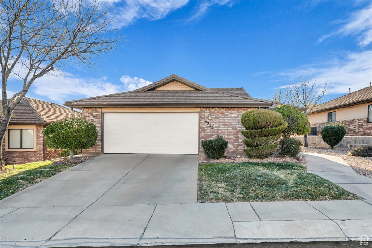 Ranch-style home with a garage