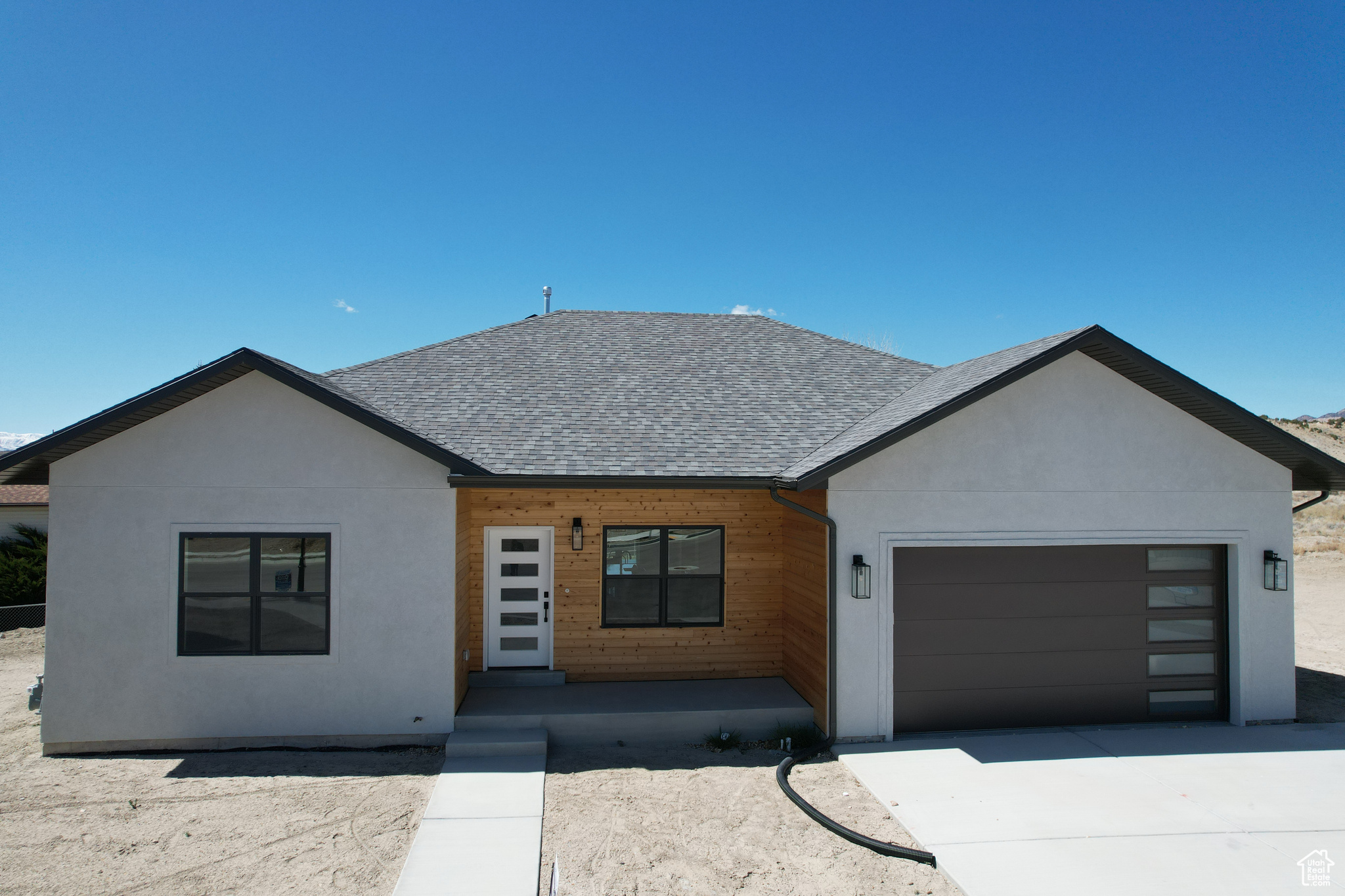 View of front of home featuring a garage