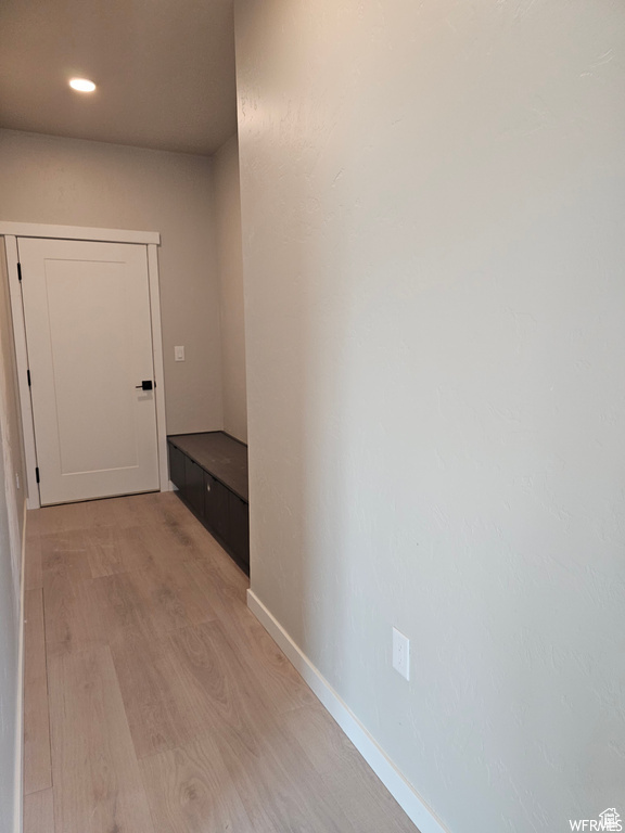 Hall with light wood-type flooring