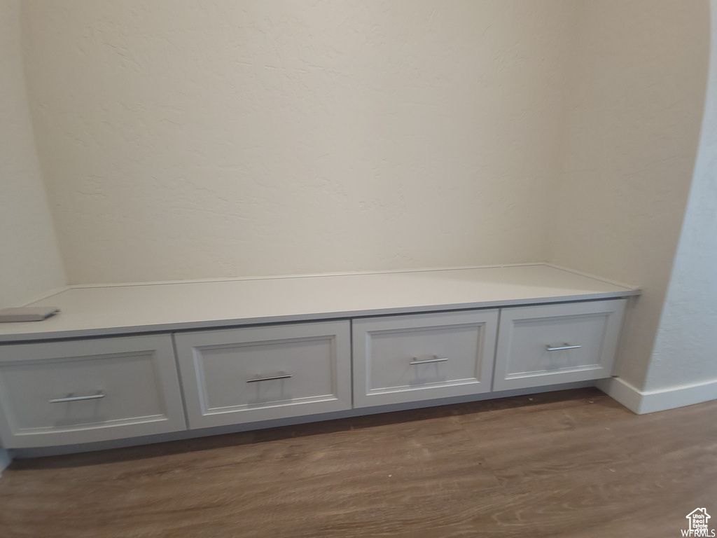 Mudroom with dark wood-type flooring