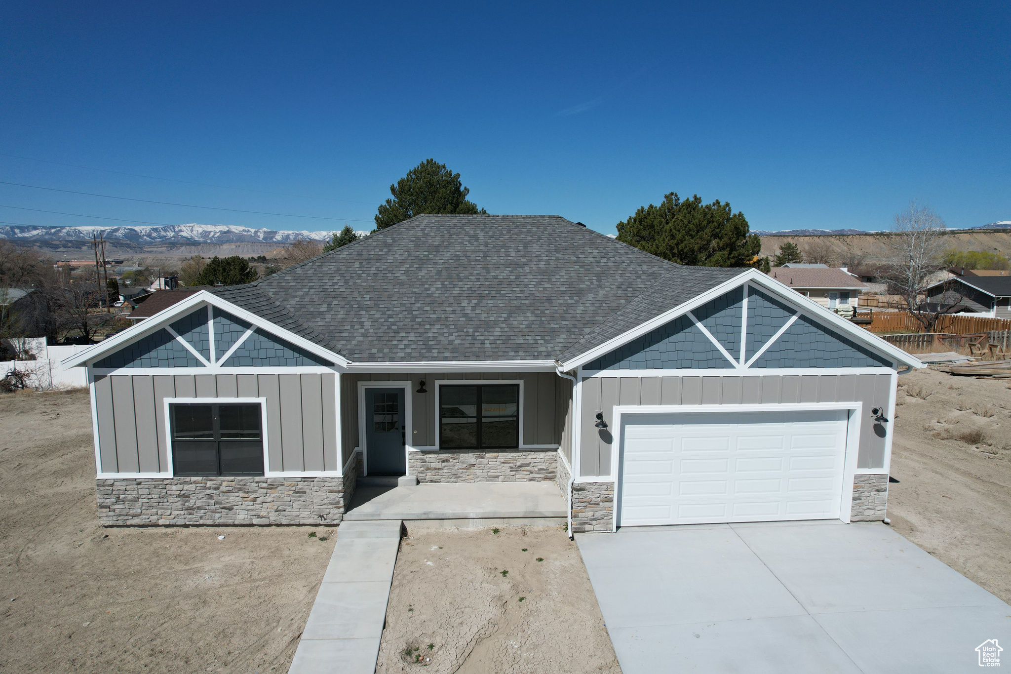 View of front of property with a garage