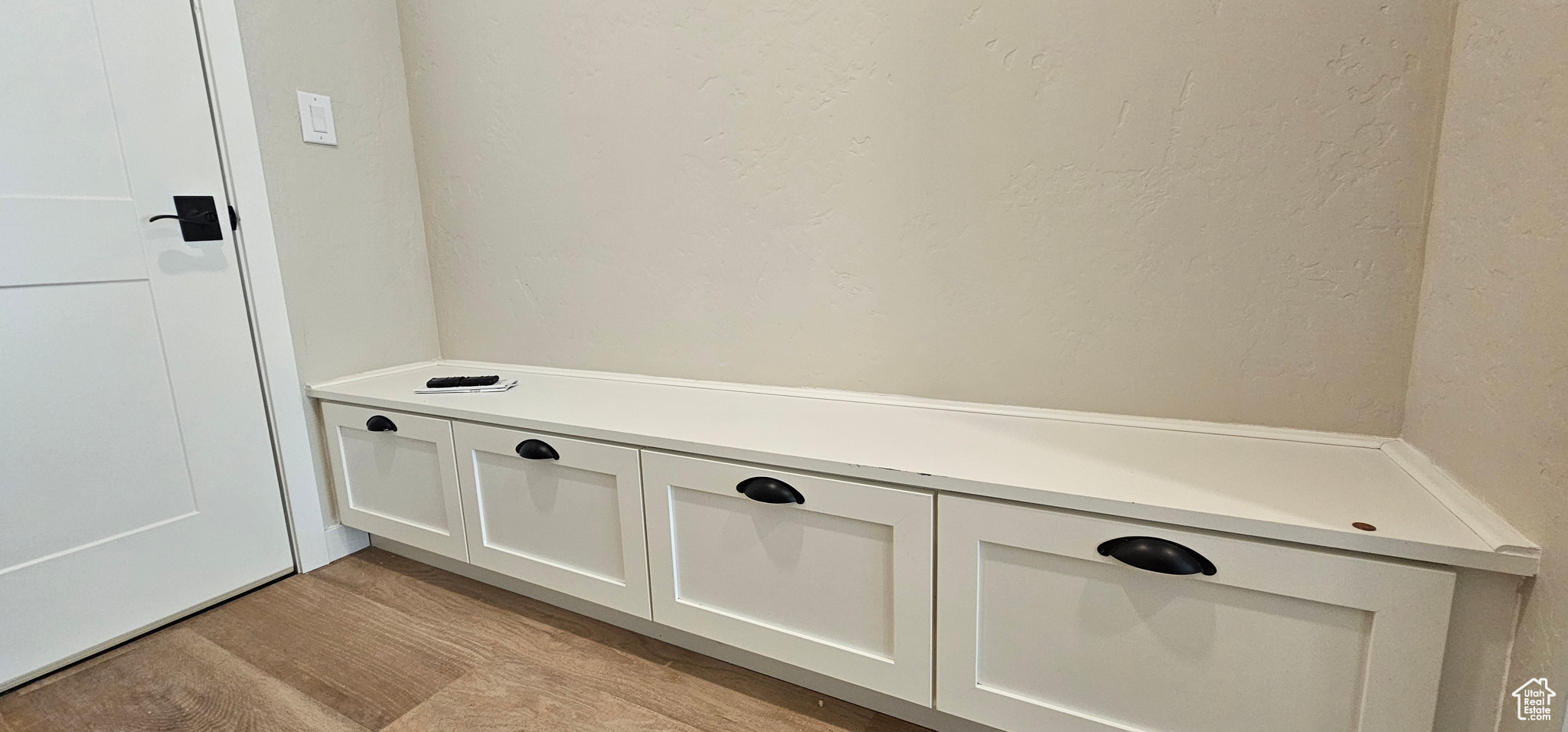 Mudroom with light wood-type flooring