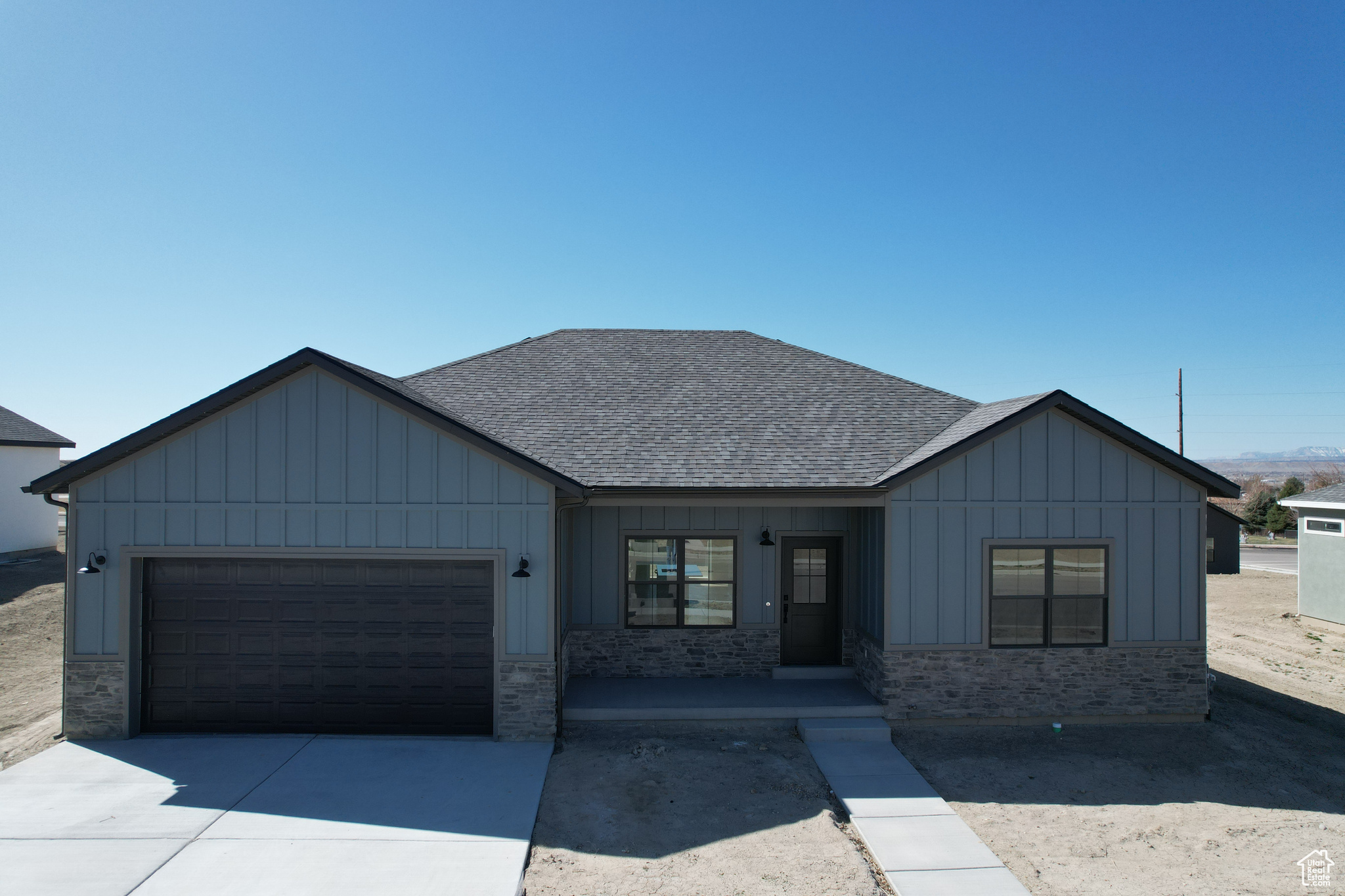 View of front of property with a garage