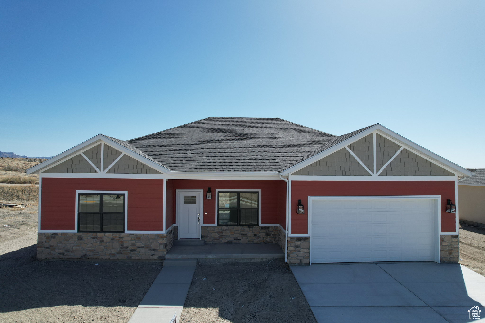 Craftsman inspired home with a garage