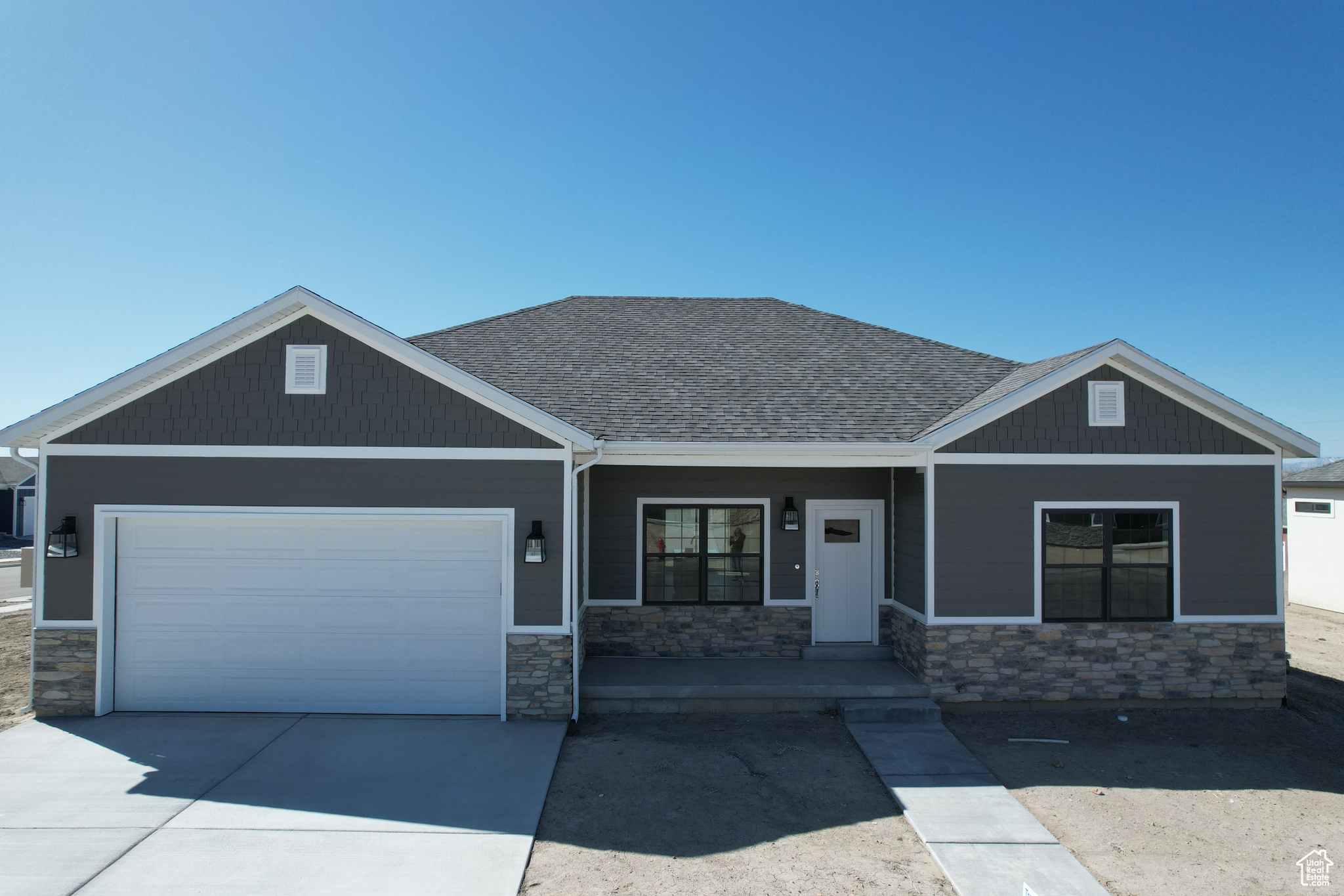 Craftsman-style house featuring a garage