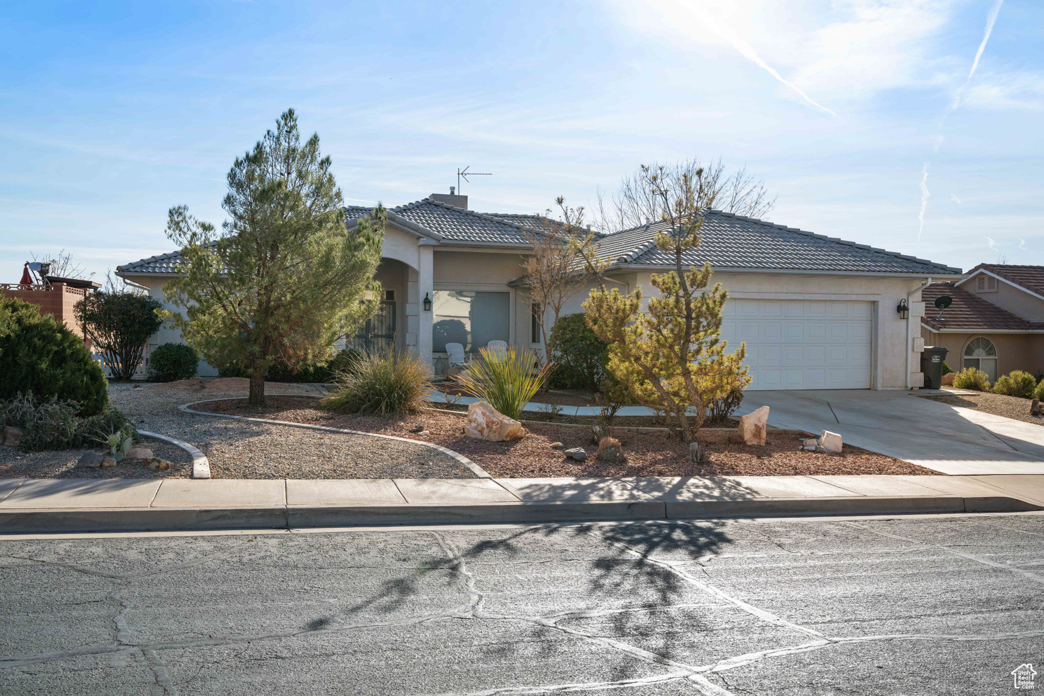 View of front of property featuring a garage