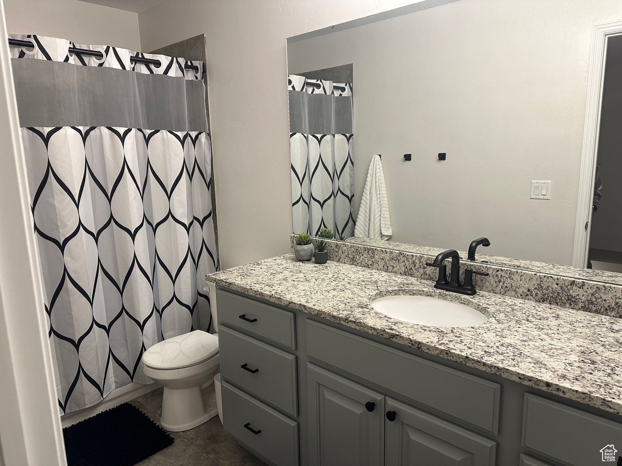 Bathroom with vanity and toilet