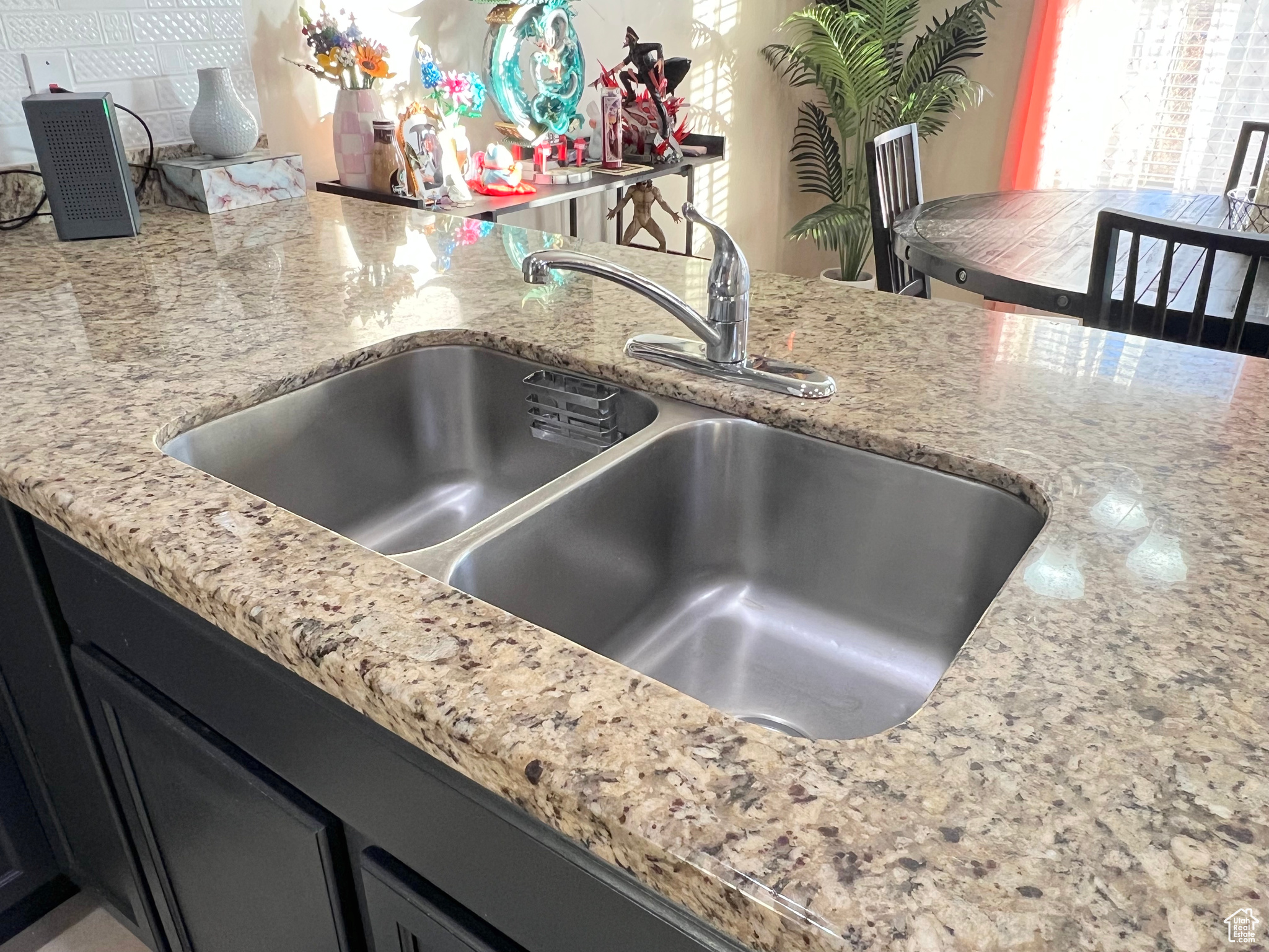 Interior details with light stone countertops and sink