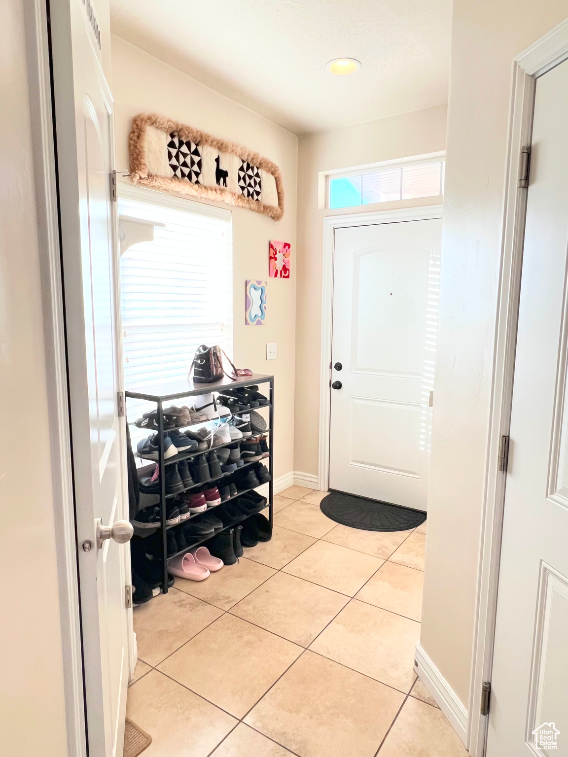 Interior space with light tile patterned floors