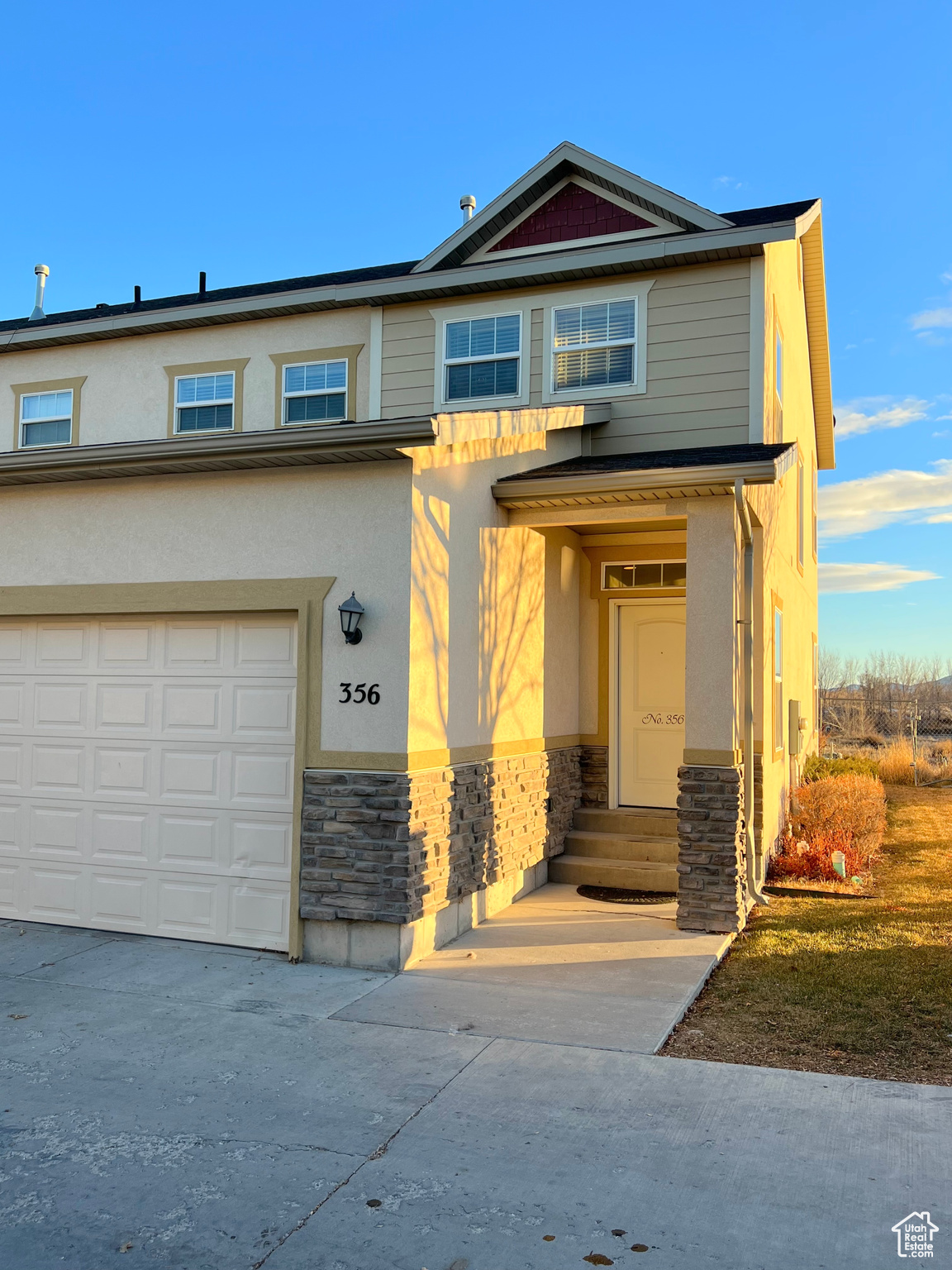 View of front of home with a garage