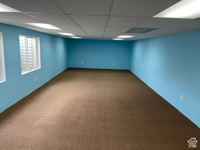 Unfurnished room featuring carpet