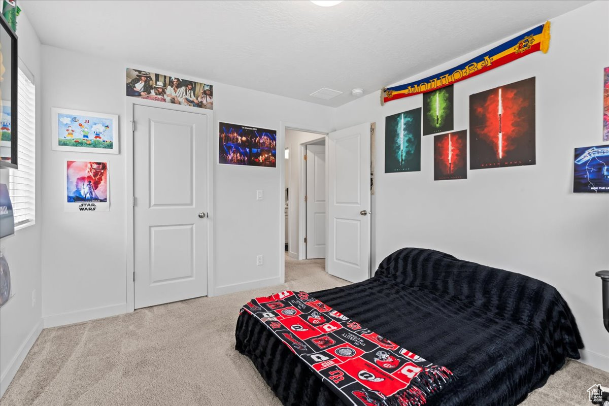 View of carpeted bedroom