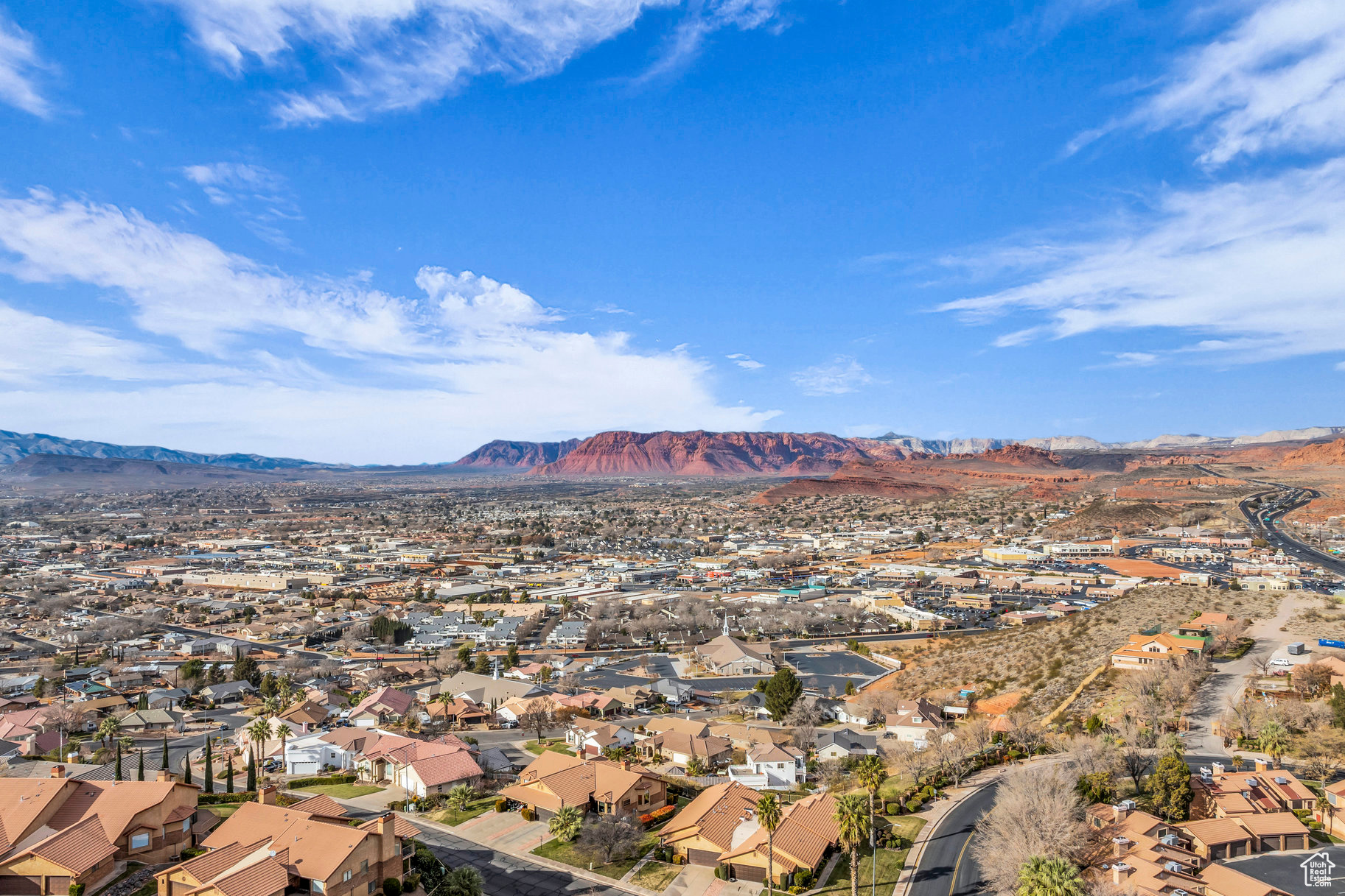 Birds eye view of property with a mountain view