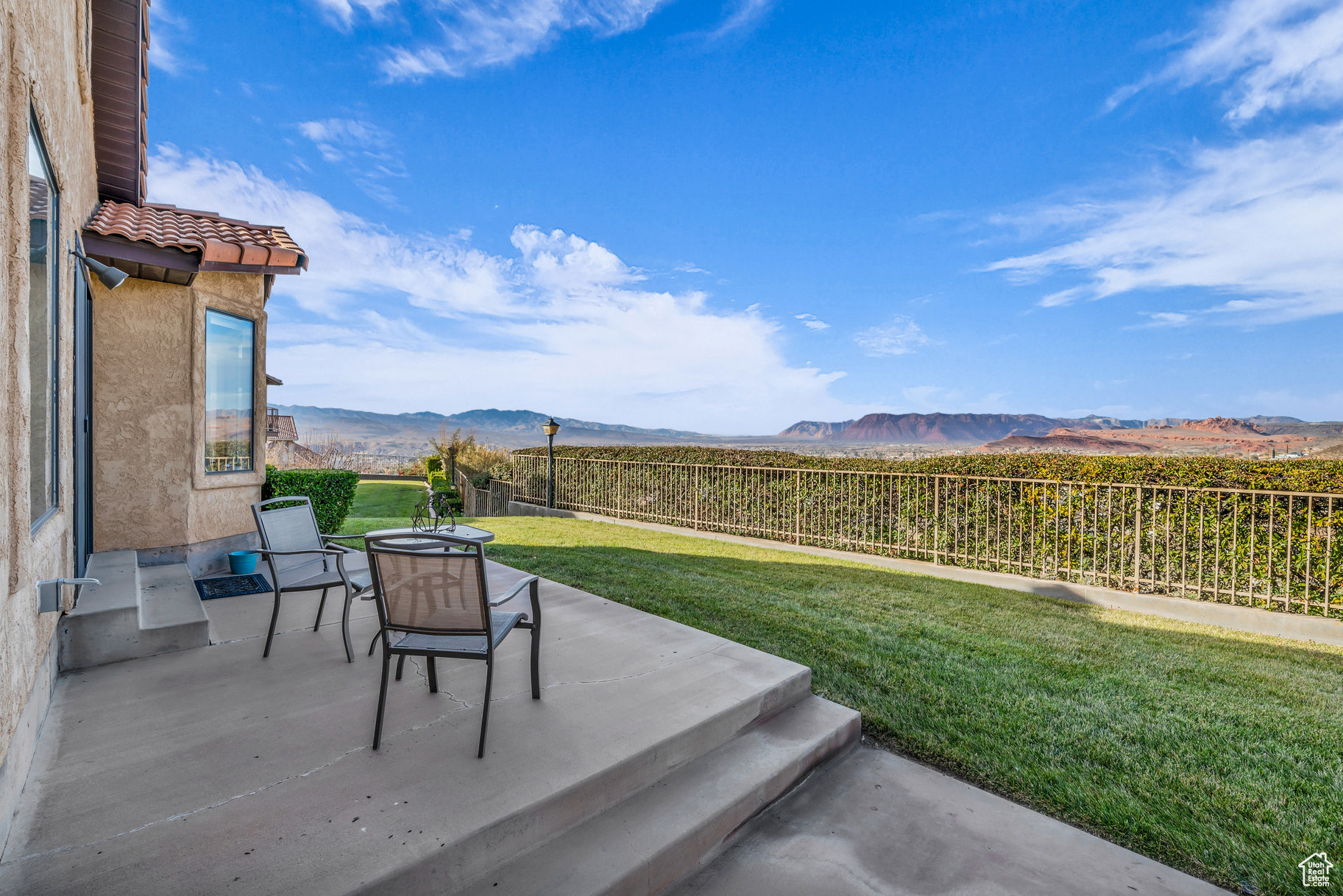 View of yard featuring a mountain view and a patio