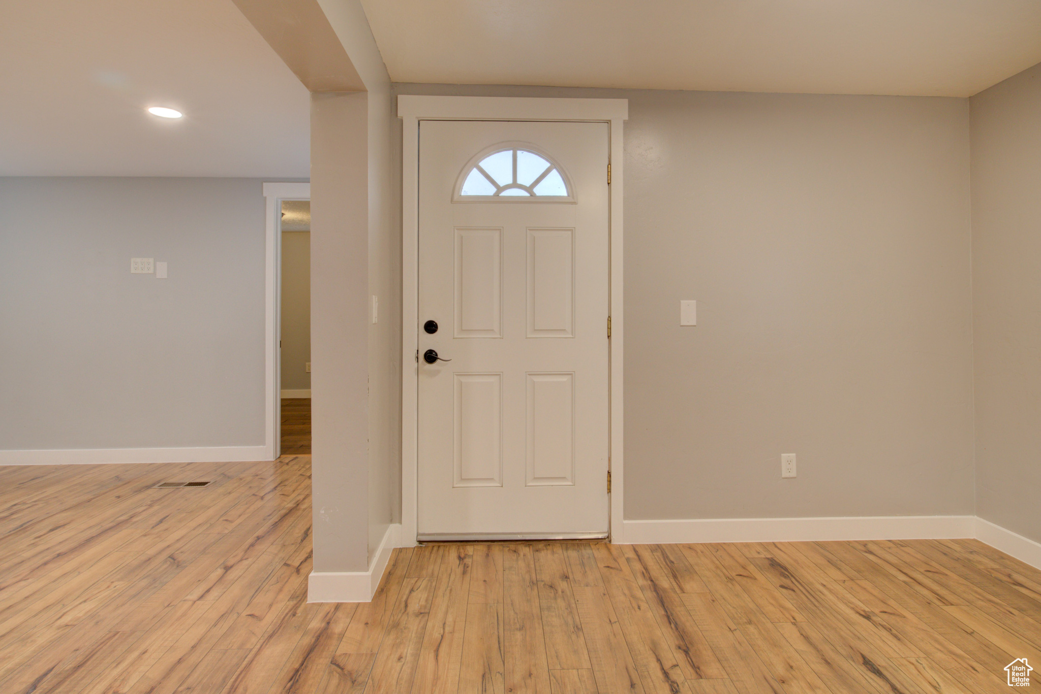 Foyer featuring light hardwood / wood-style floors