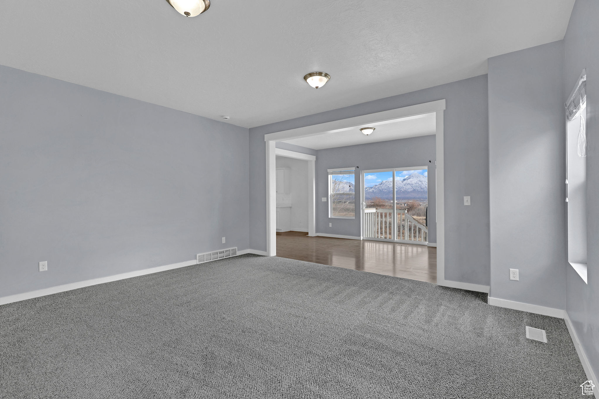 View of carpeted spare room