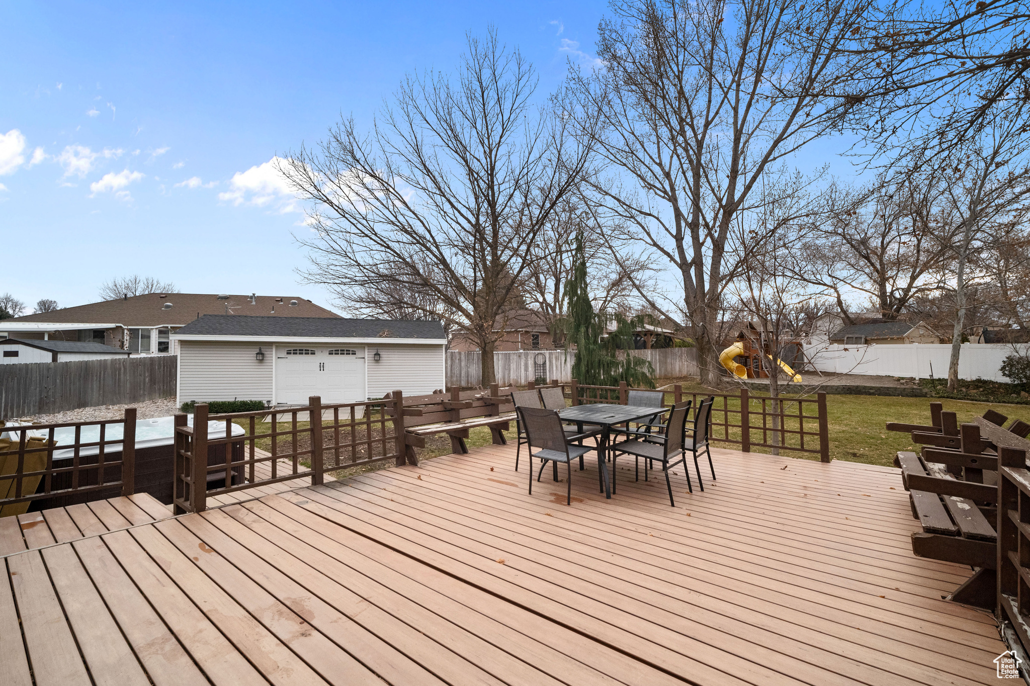 Deck featuring a lawn