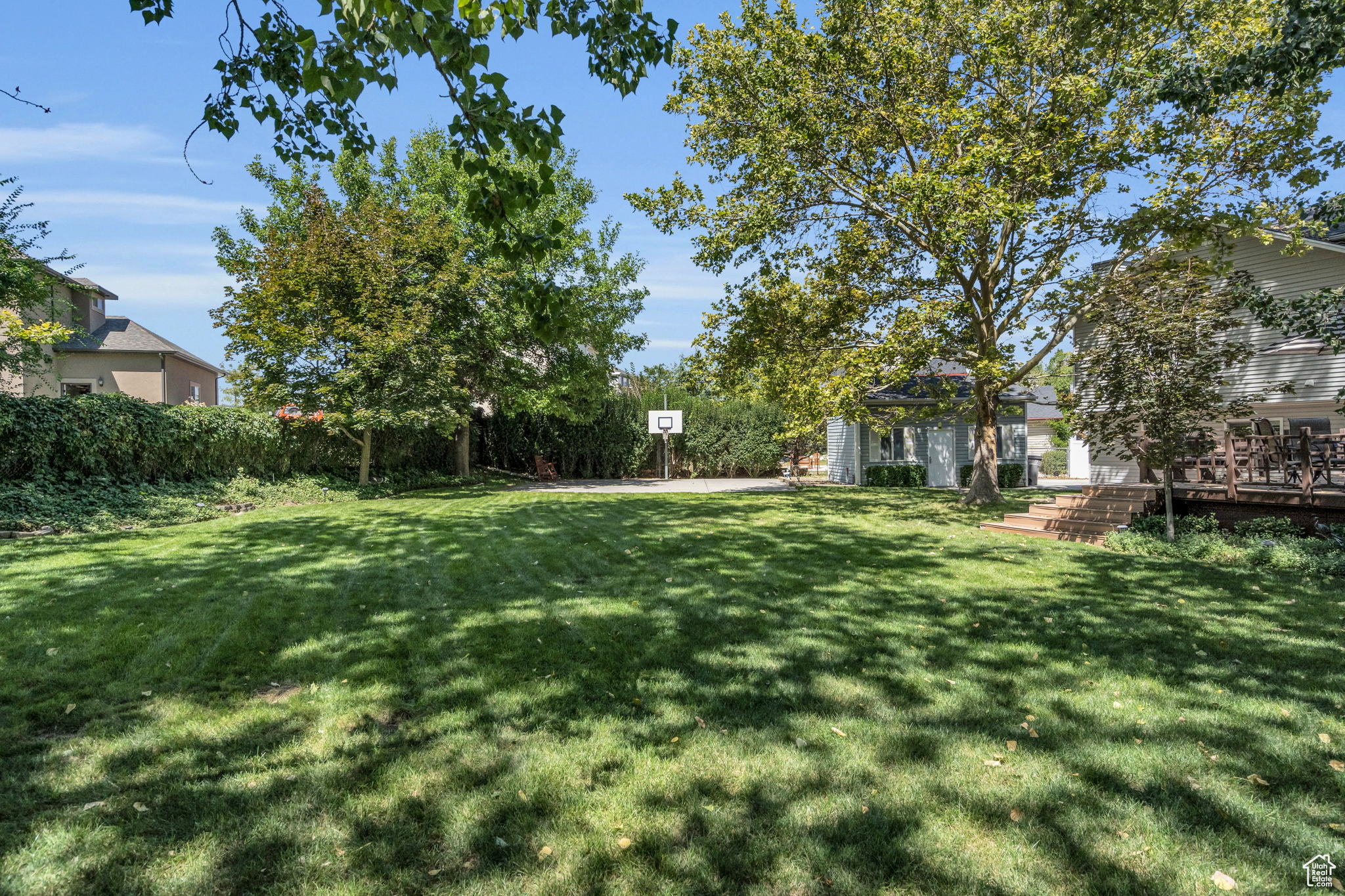 View of yard featuring a deck