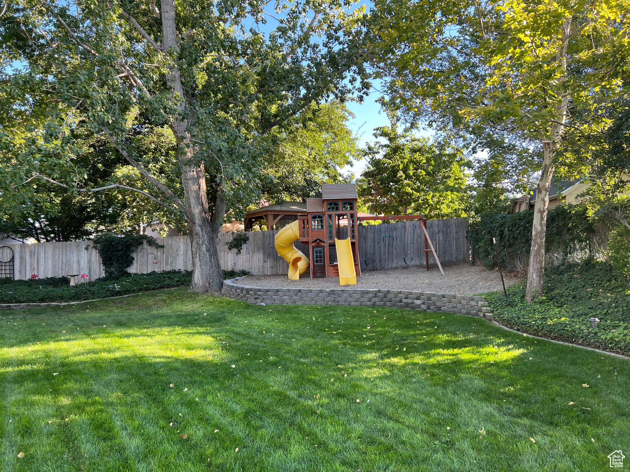 View of yard featuring a playground