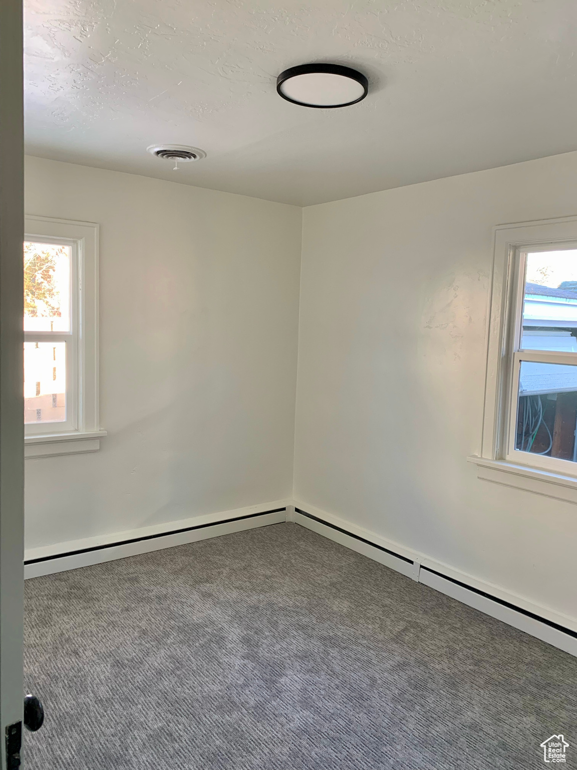 Empty room featuring carpet