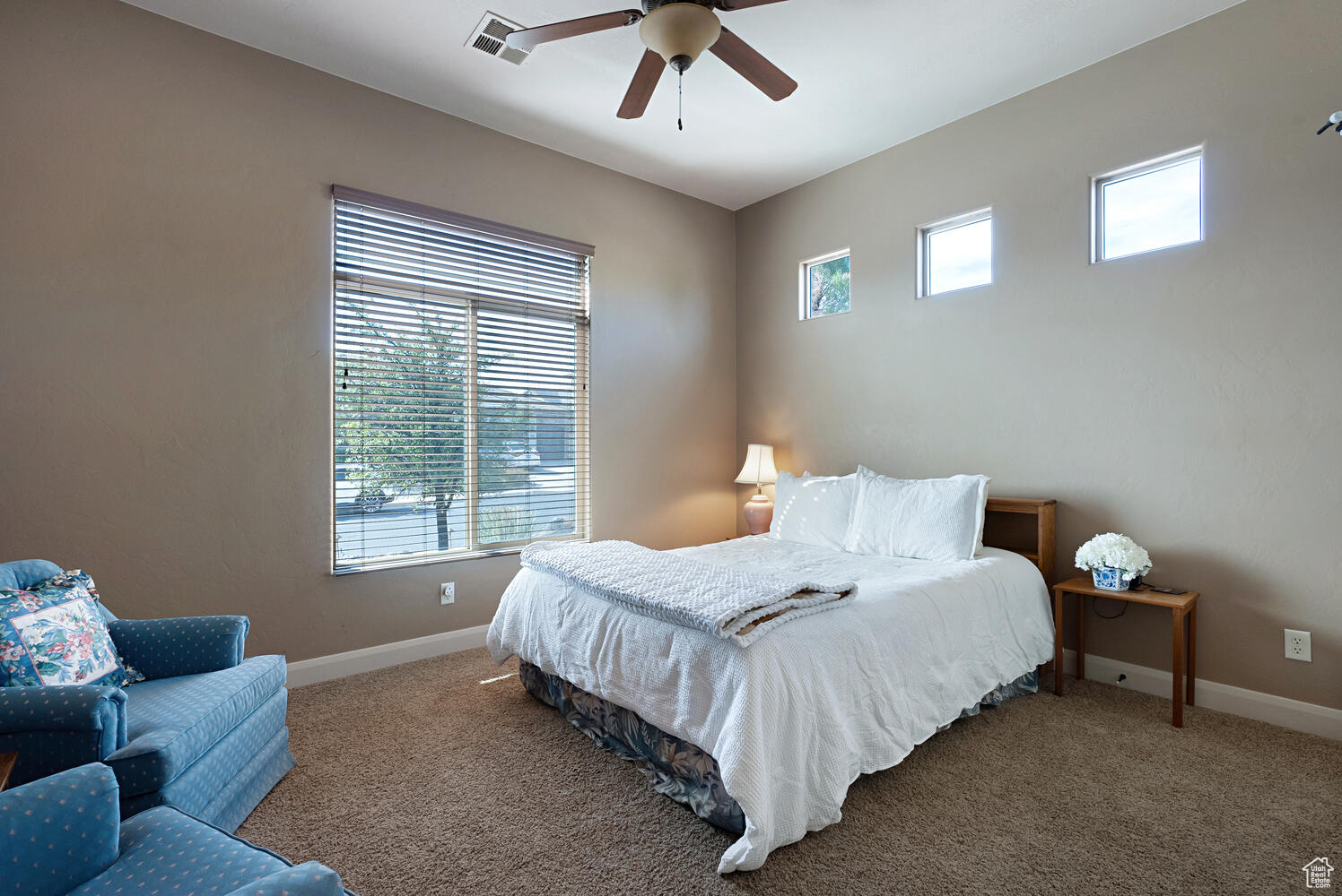 Bedroom with carpet flooring and ceiling fan