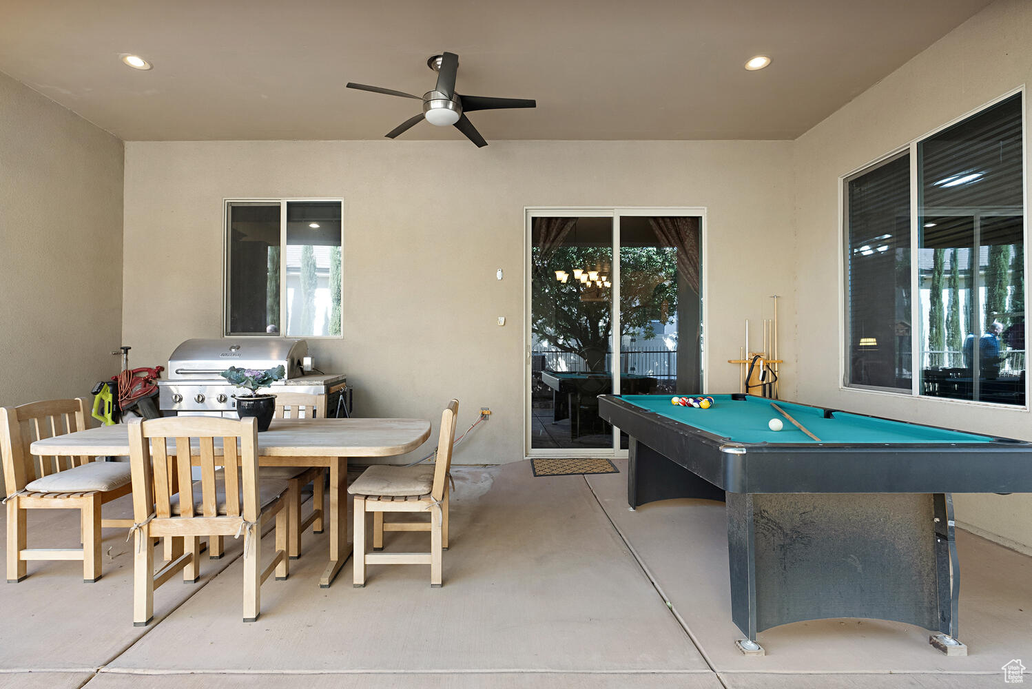 View of patio / terrace with area for grilling and ceiling fan