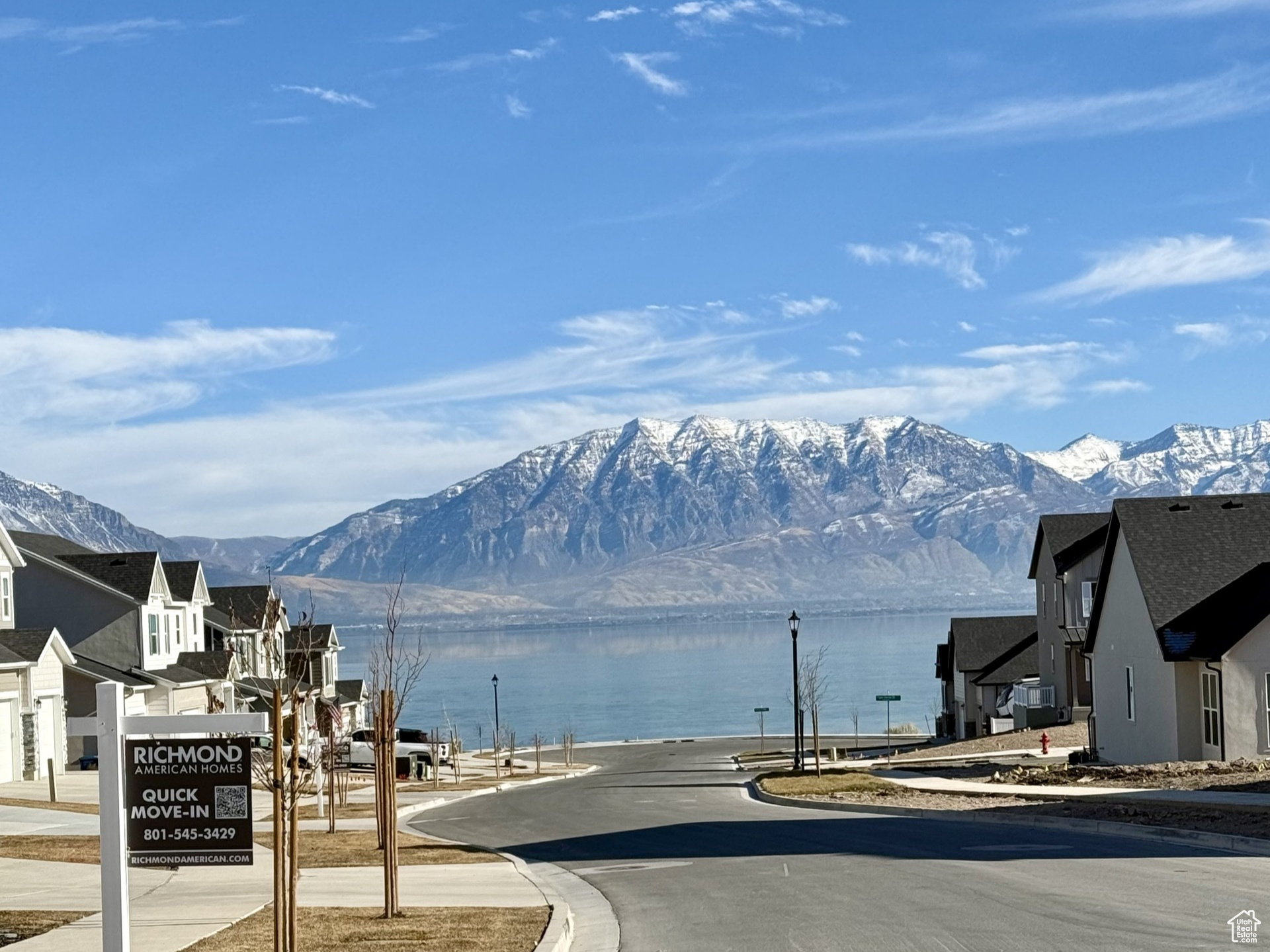 View of street with a water and mountain view