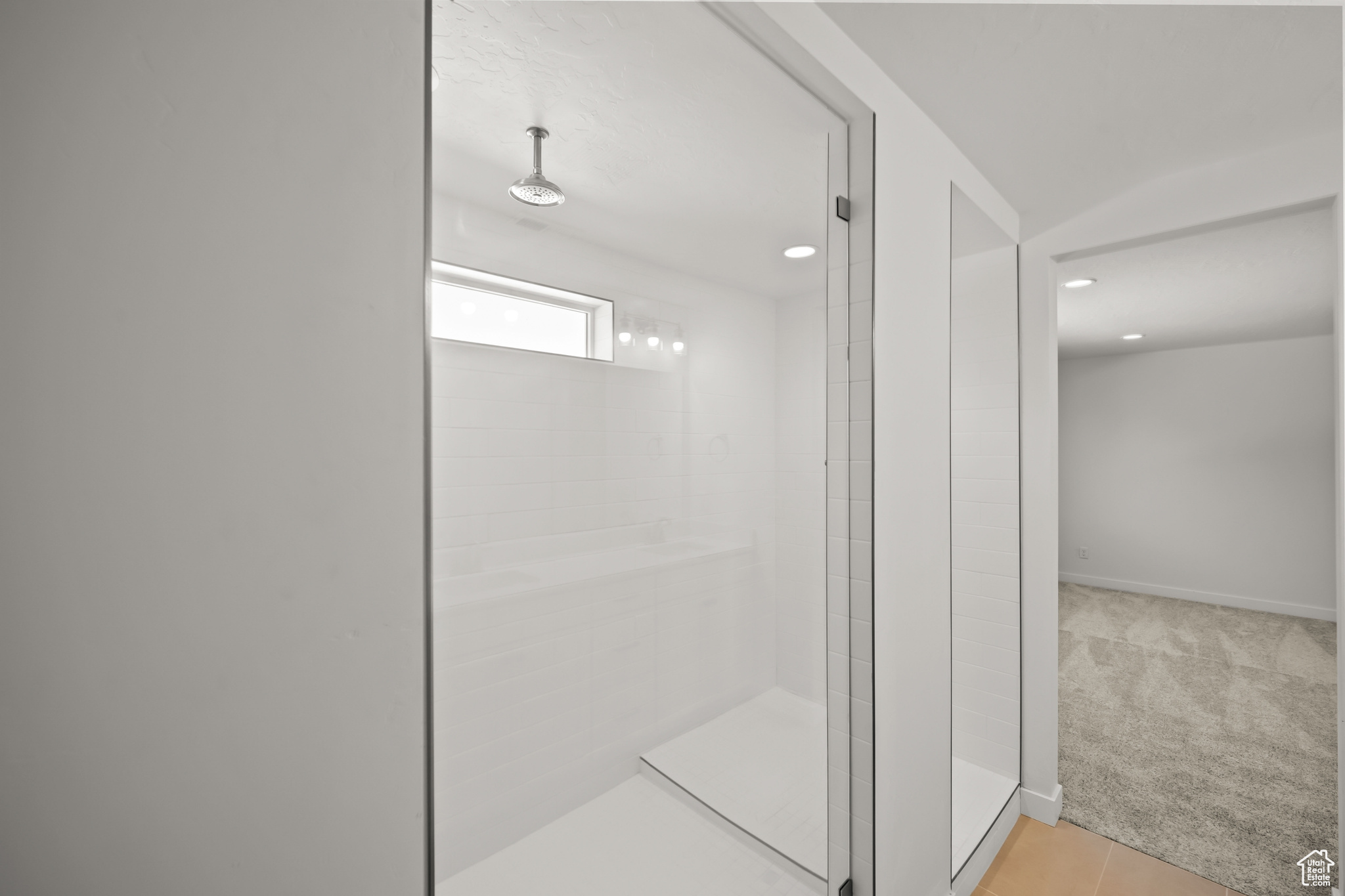 Bathroom featuring tiled shower