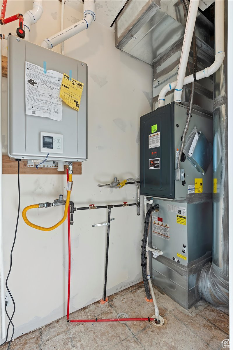 Utility room with tankless water heater