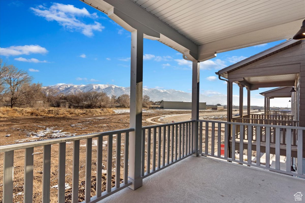 Balcony featuring a mountain view